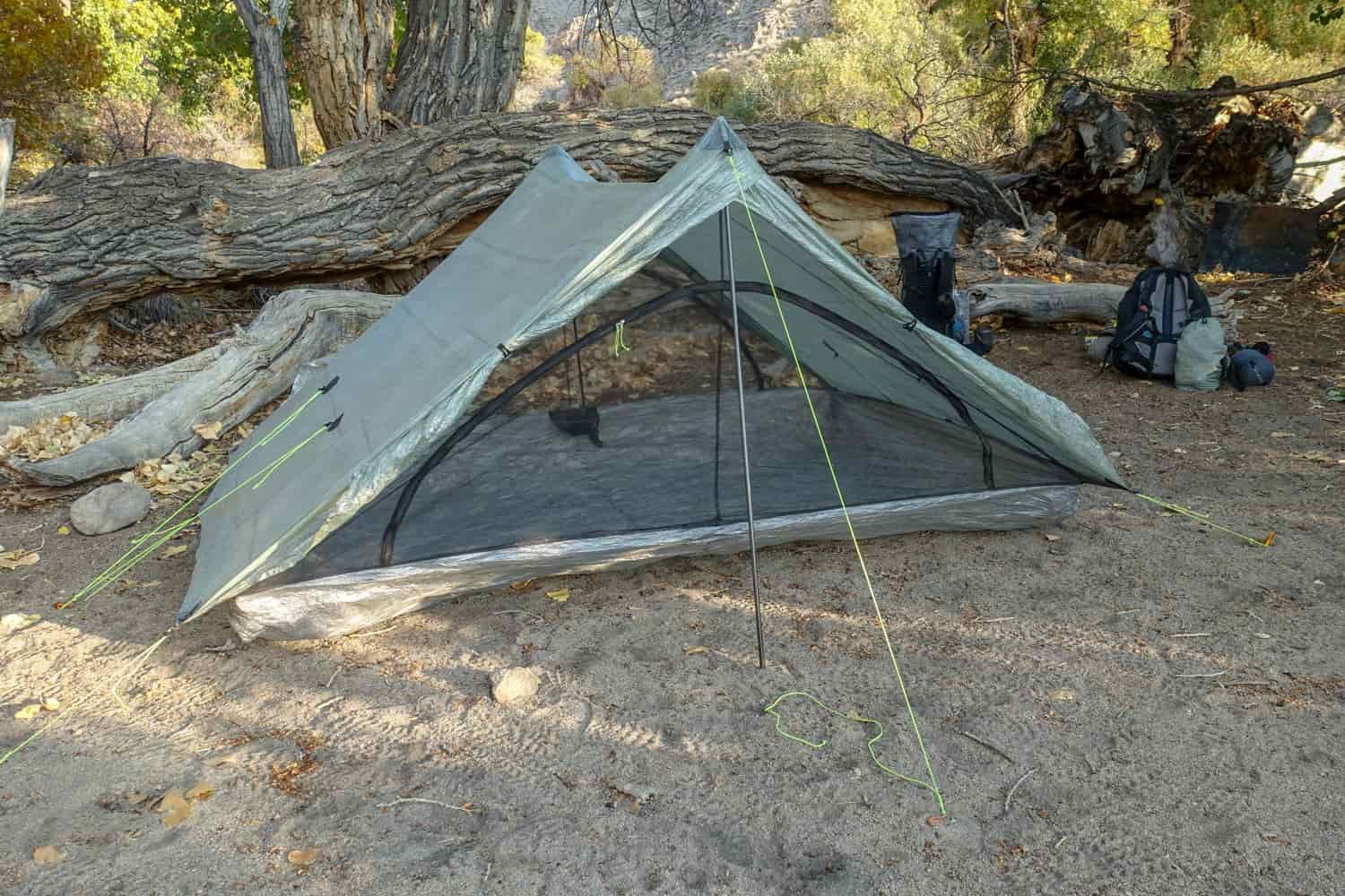 the side view of the zpacks triplex in a desert campsite
