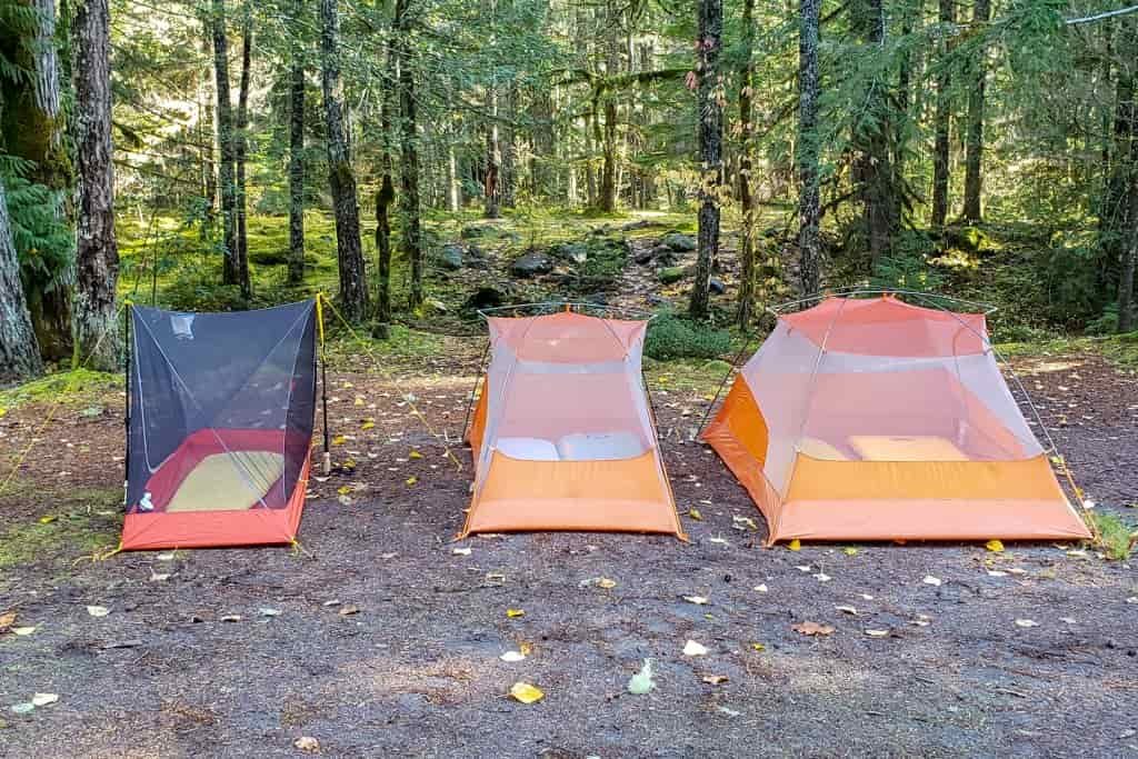 A 1-person, 2-person, an 3-person tent lined side by side to show how much room each provides