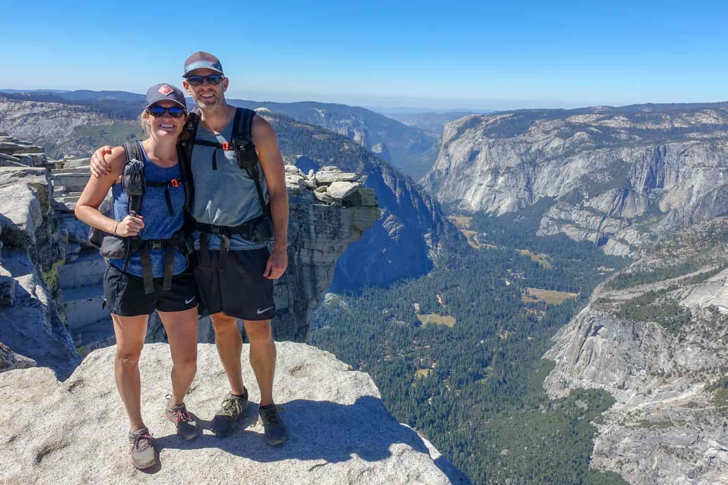 backpackers on top of half dome in yosemite