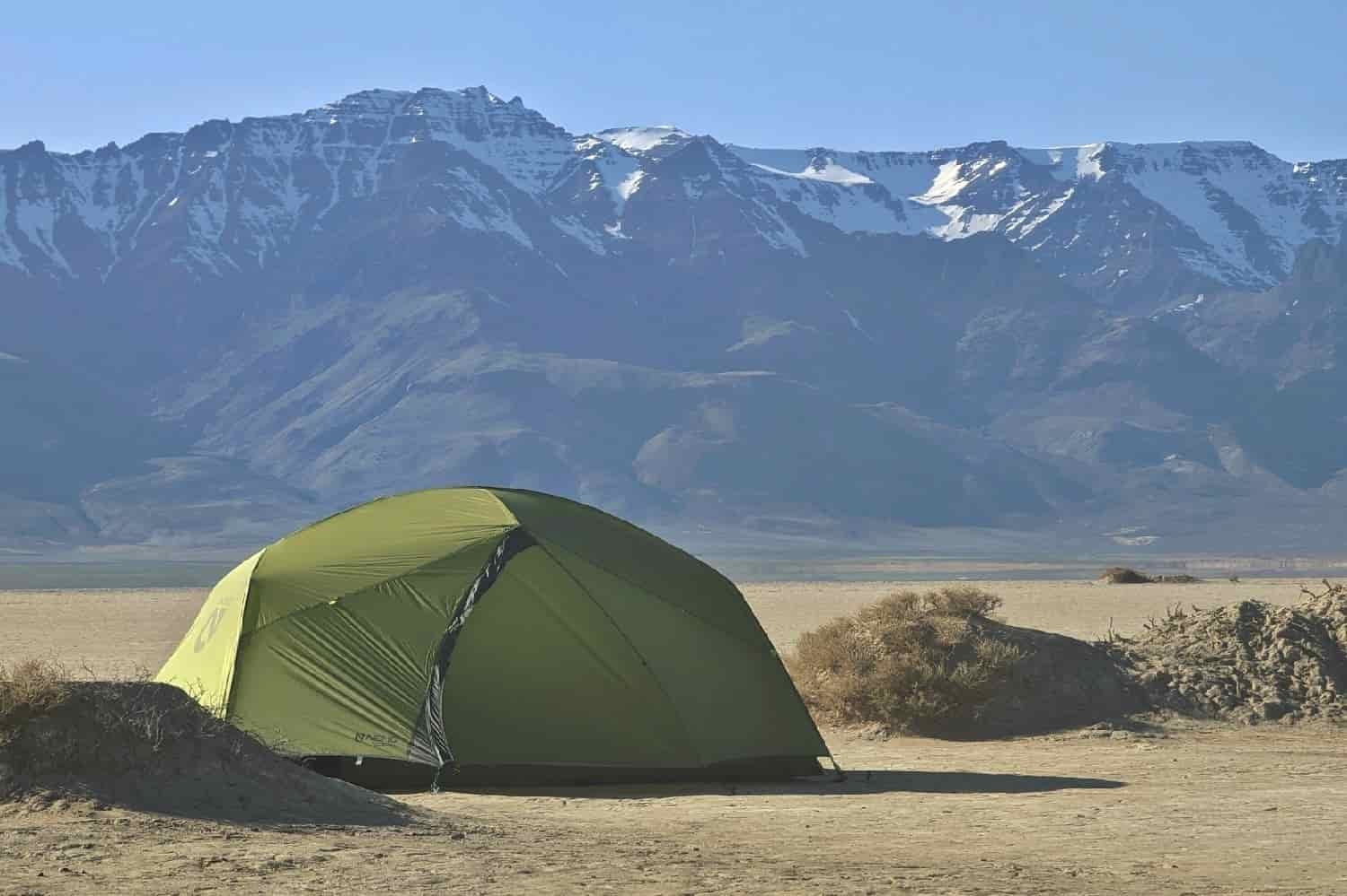 the nemo dagger 2 on a desert playa with snow capped mountains in the distance