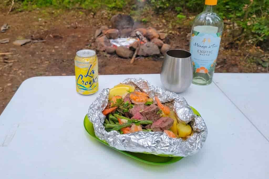 ingredients inside a foil sheet on a table