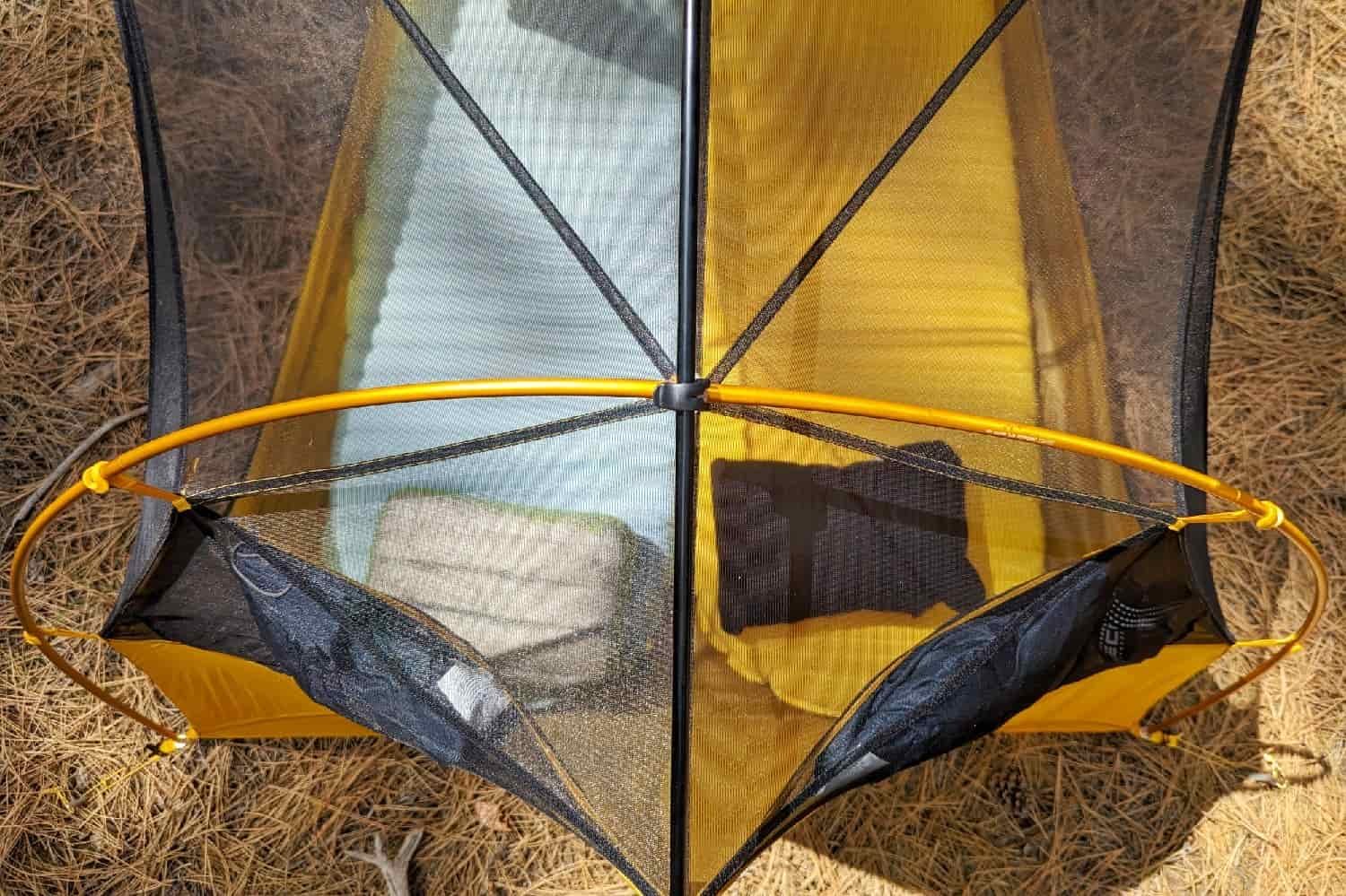 a view from above a tent without the rainfly on to show the sleeping pad and pillows set up inside