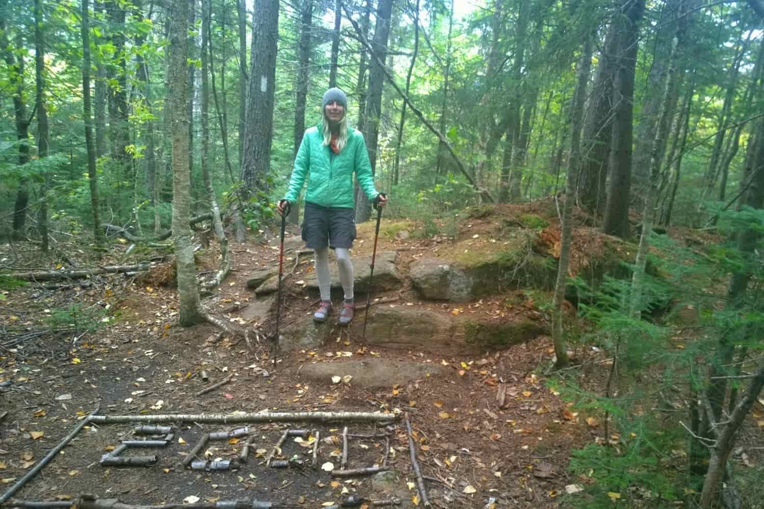 Appalachian Trail thru-hiker makes the number 2000 out of sticks on the ground to celebrate hiking 2000 miles.