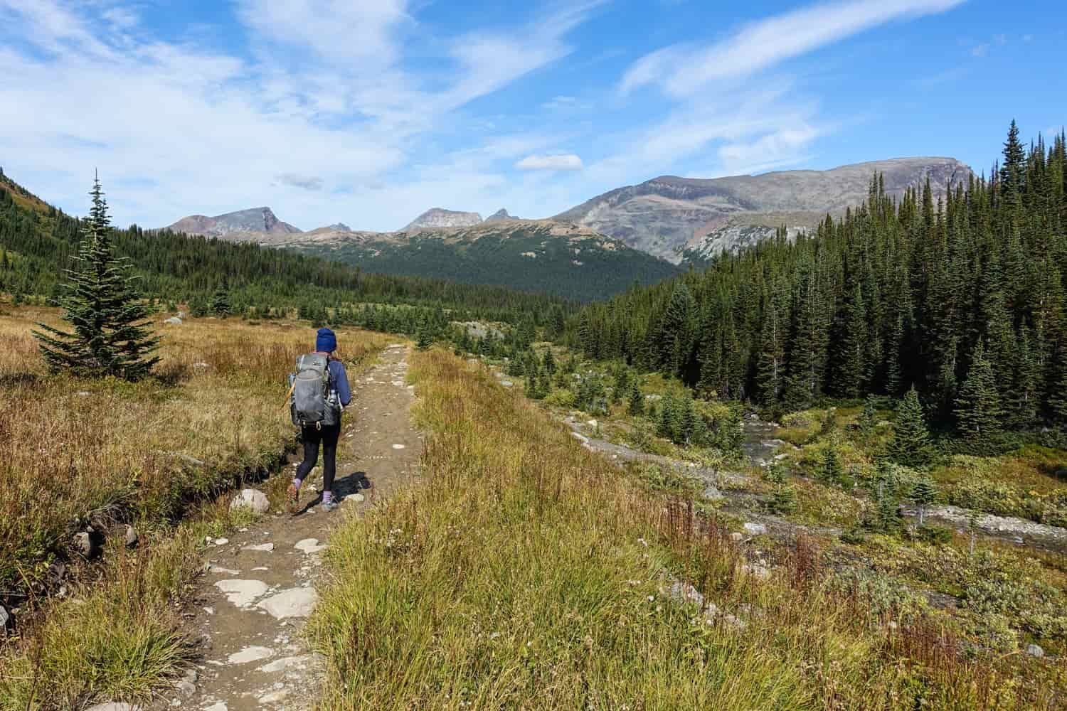 a backpacker starting on the skyline trail in jasper national park