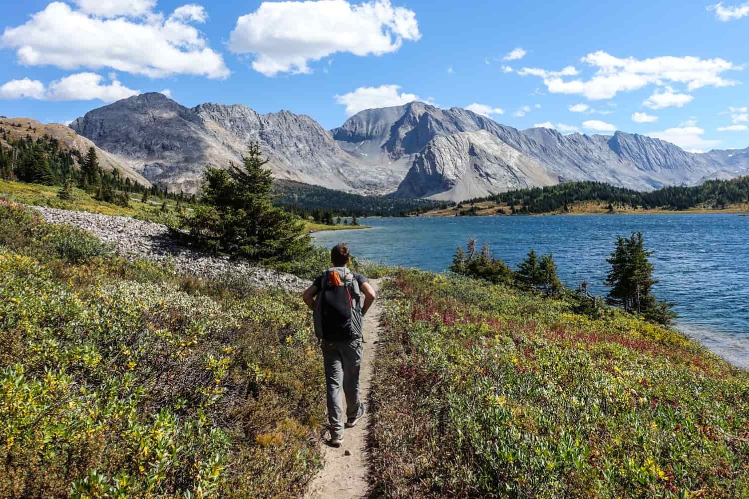 backpacker on the sawback trail in banff national park