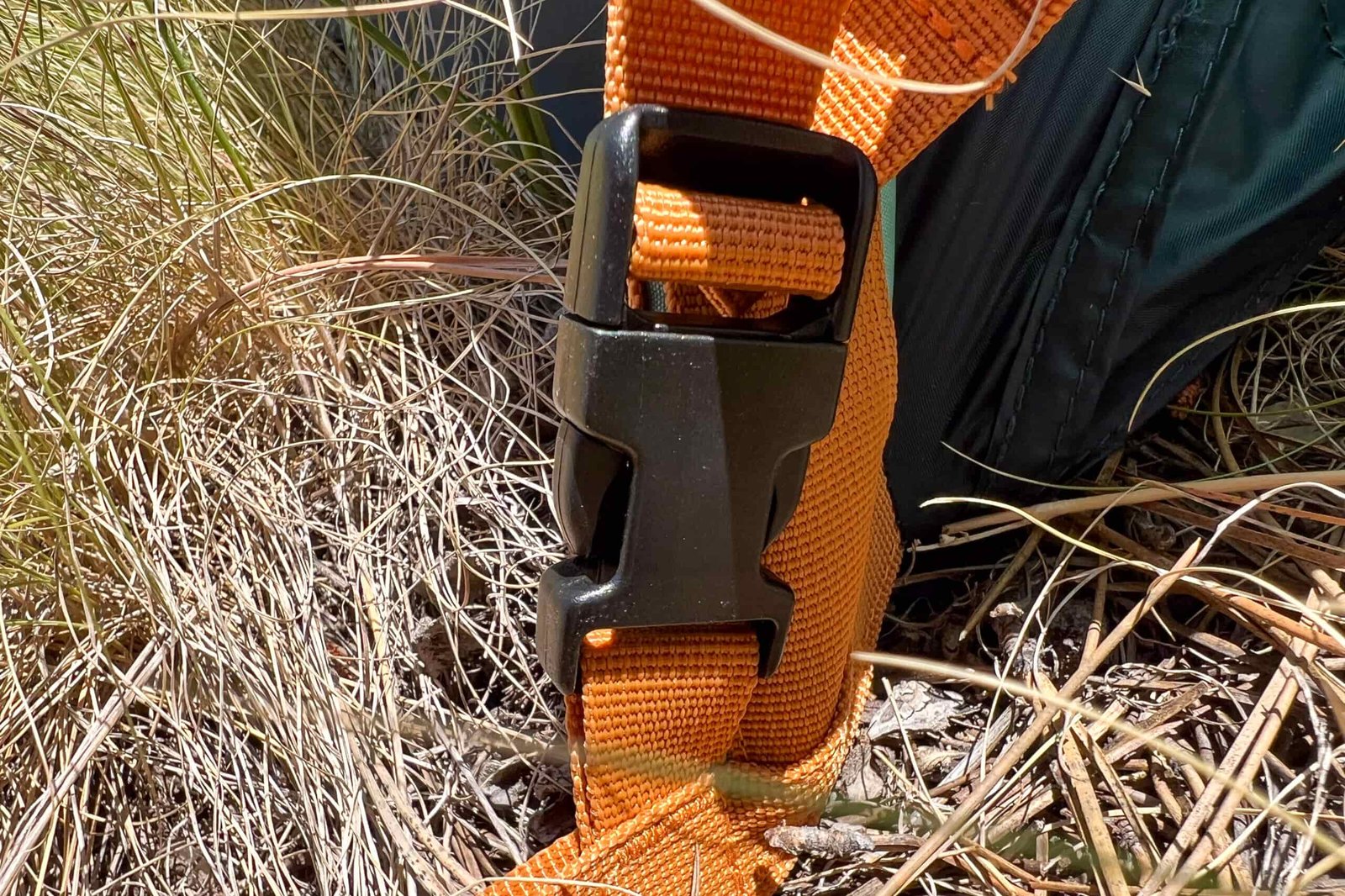 The image shows the orange color coded webbing that allows the rainfly to be easily oriented.
