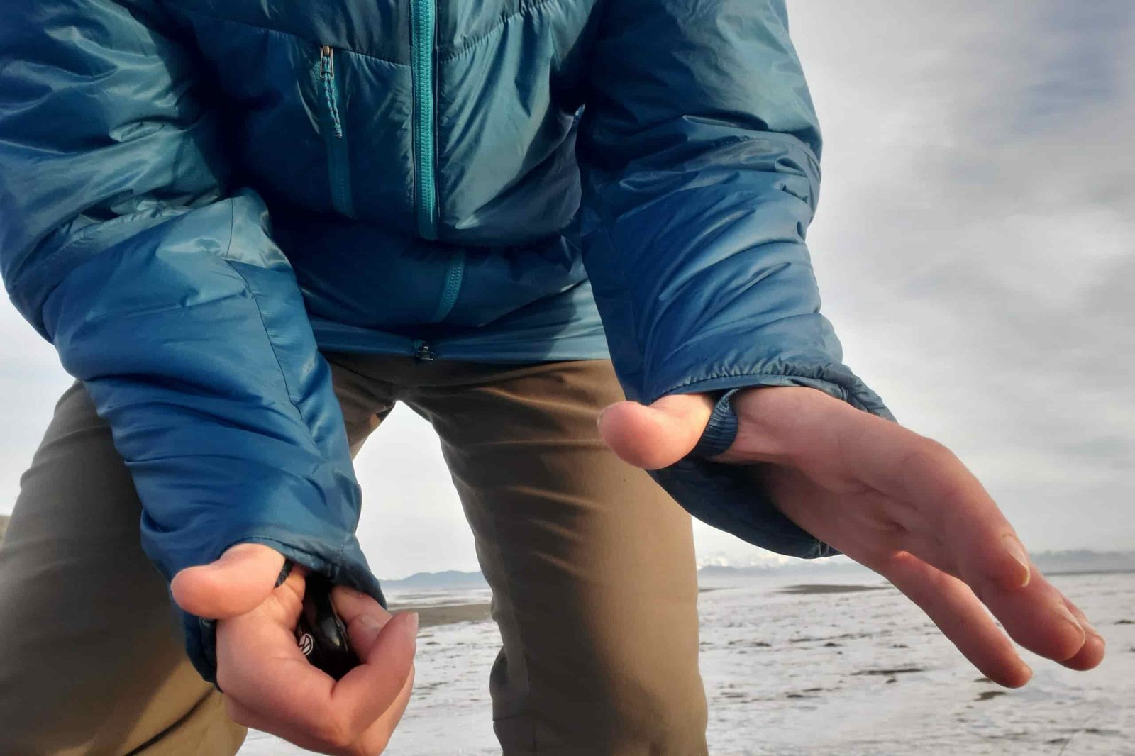 A closeup of the thumb loops on a jacket.