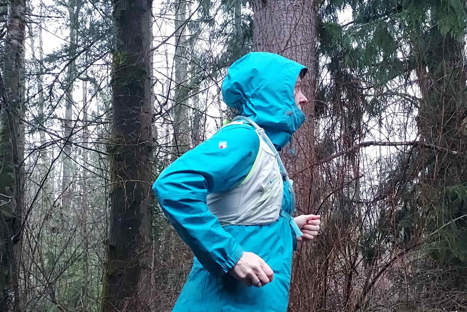 Runner wearing the Nathan Pinnacle 12 Hydration Race Vest