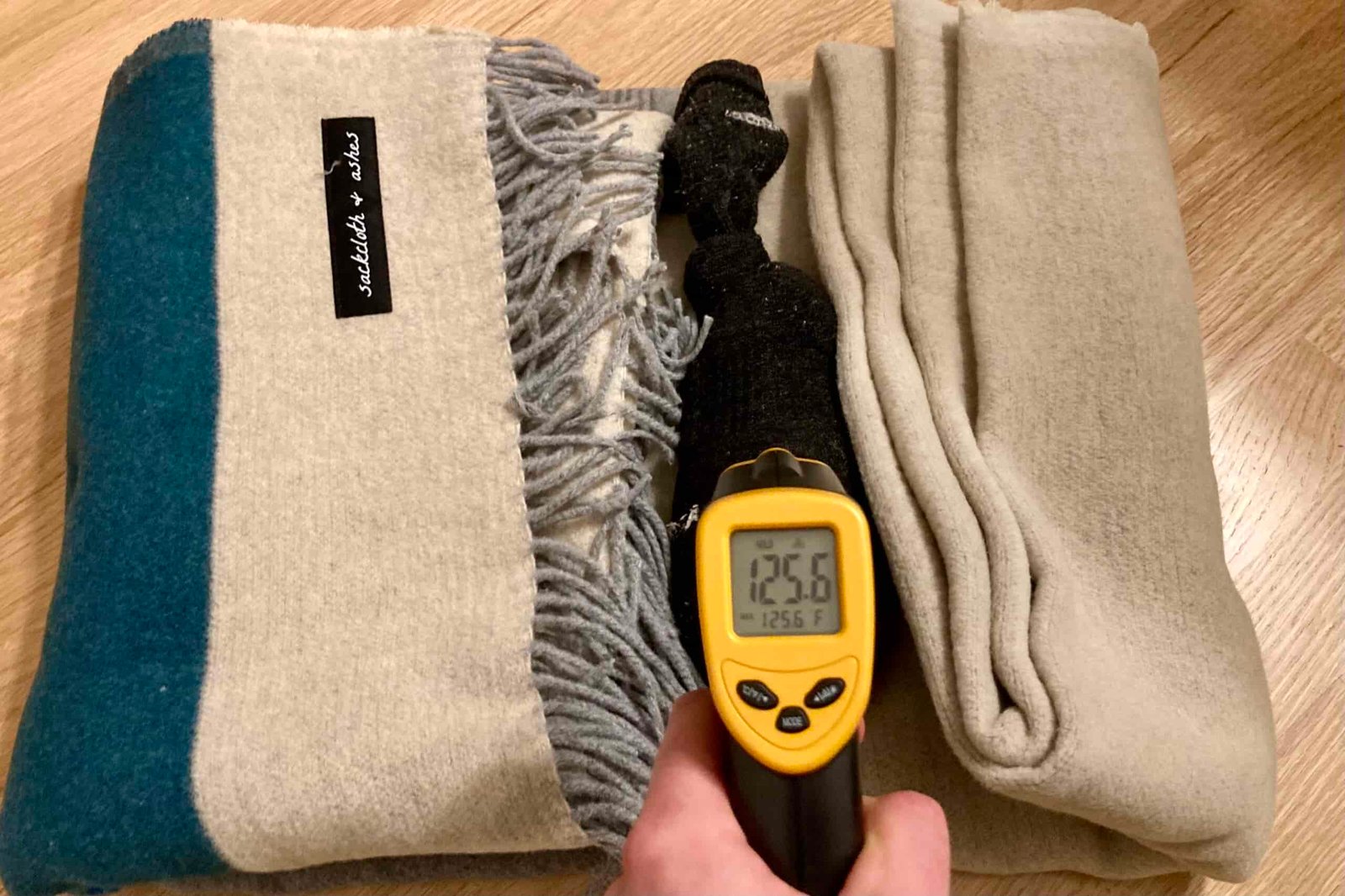 The final reading on the infrared thermometer after a heat sock was wrapped in the Sackcloth and Ashes blanket for 30 min. It reads 125.6F.