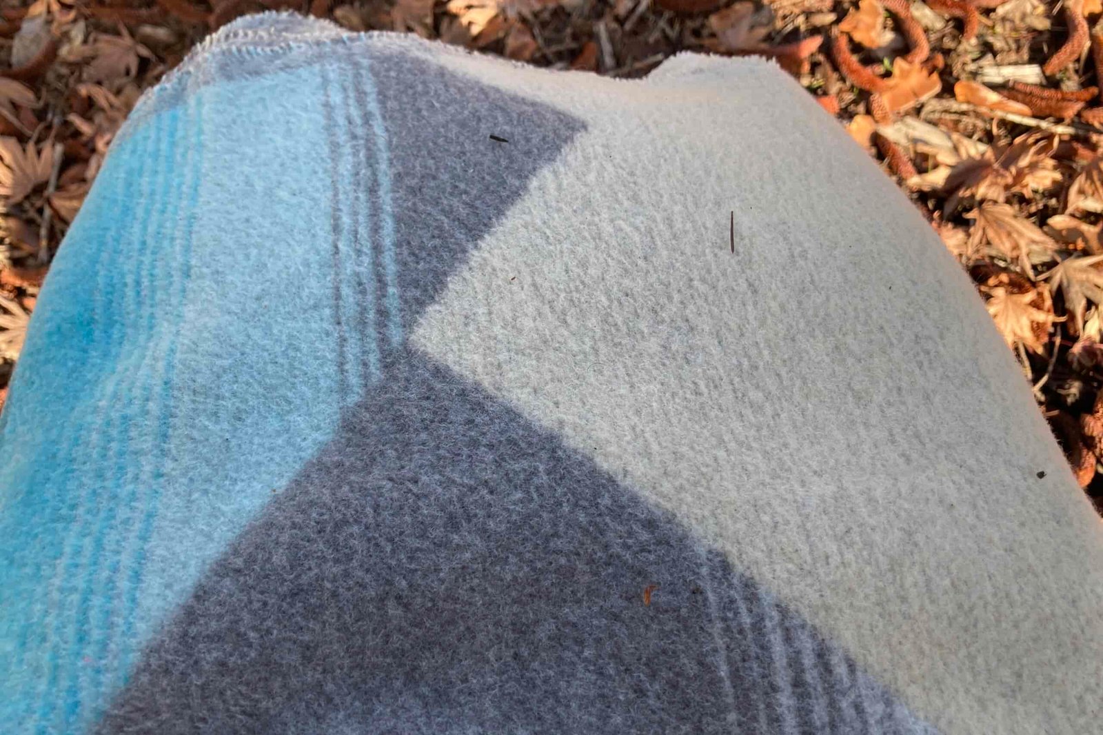 Close-up showing the debris cling to the fabric of the Sackcloth and Ashes blanket.