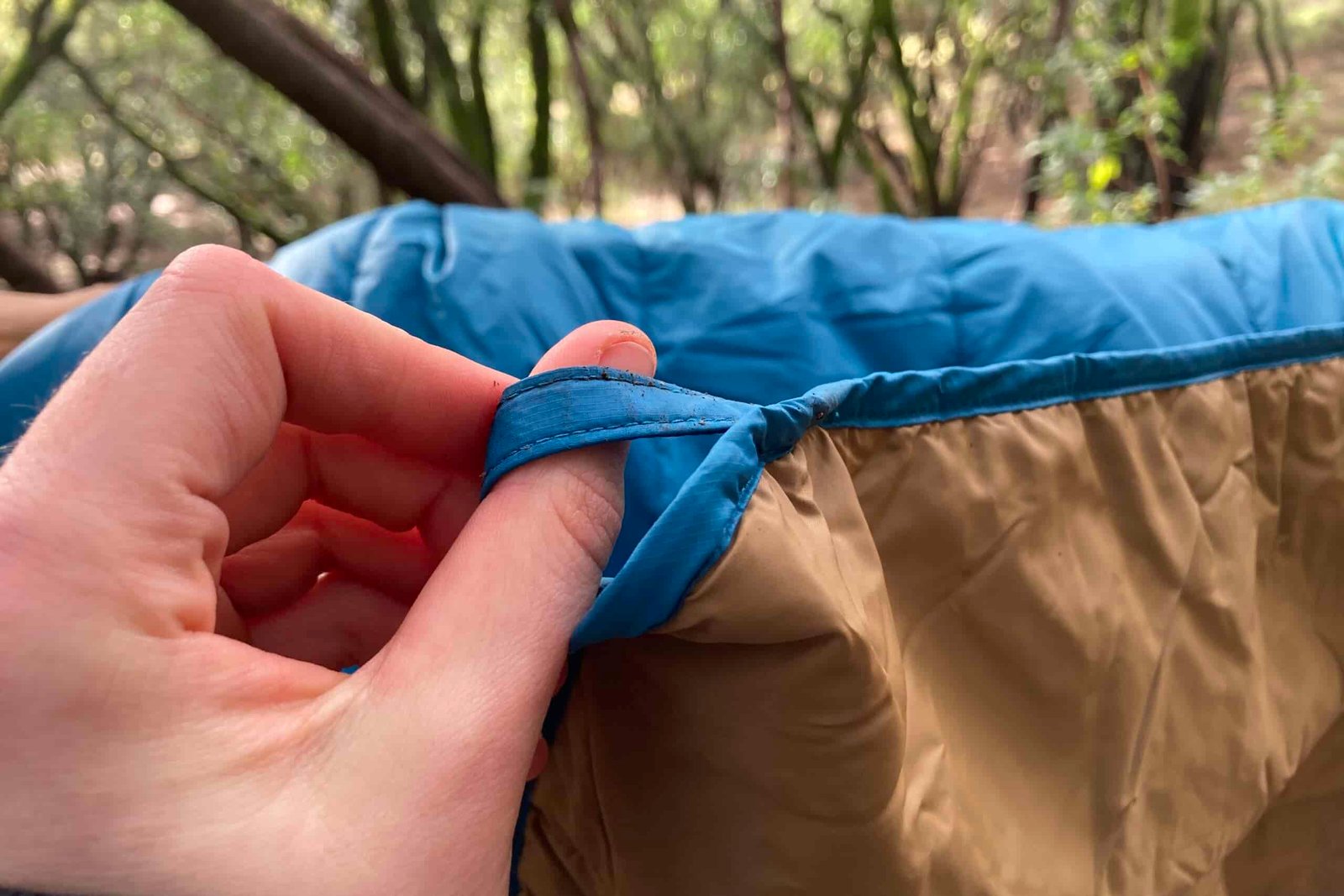 Close up showing the corner loop on the REI Camp Blanket