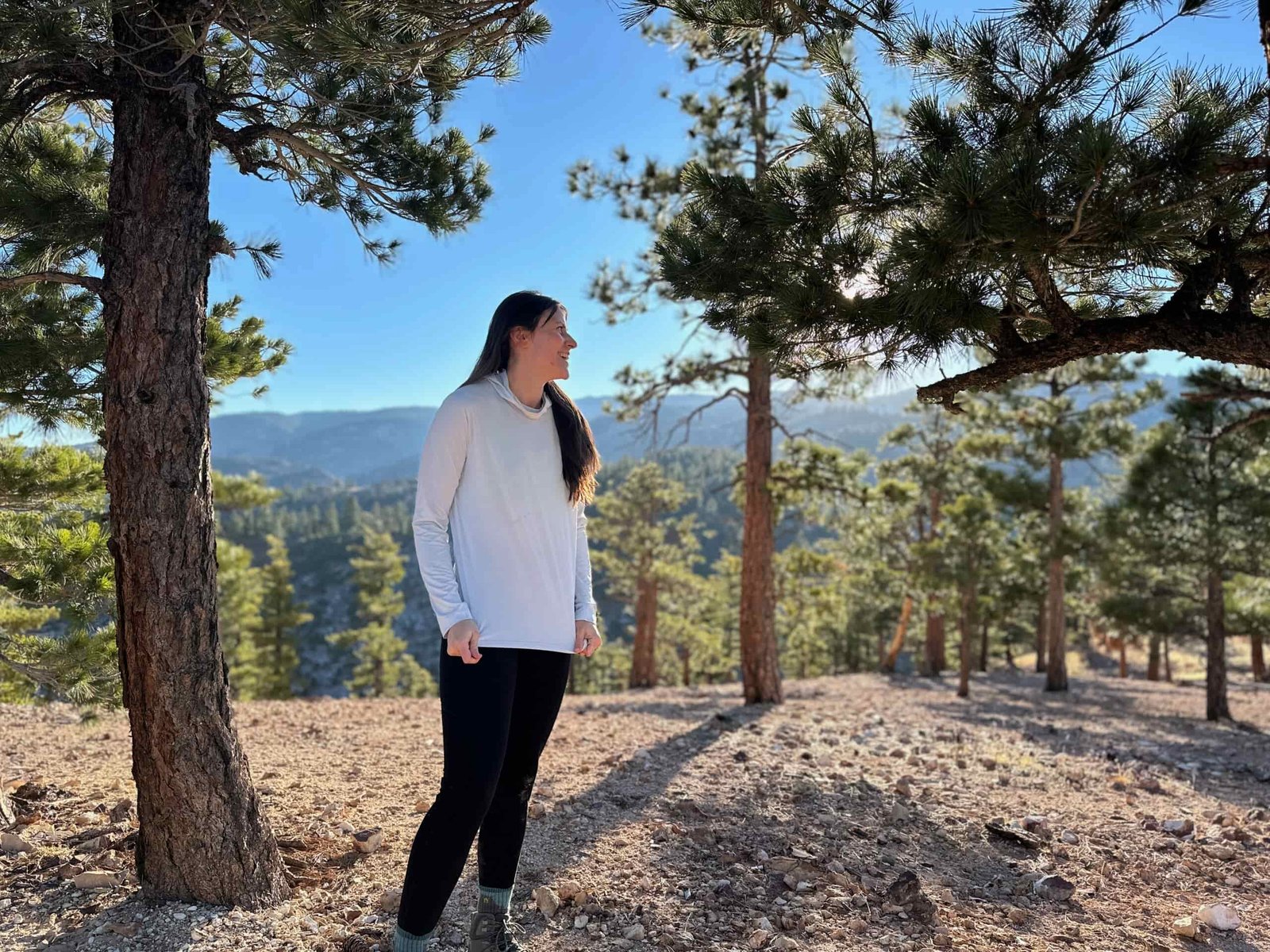 woman hiking and running through high desert