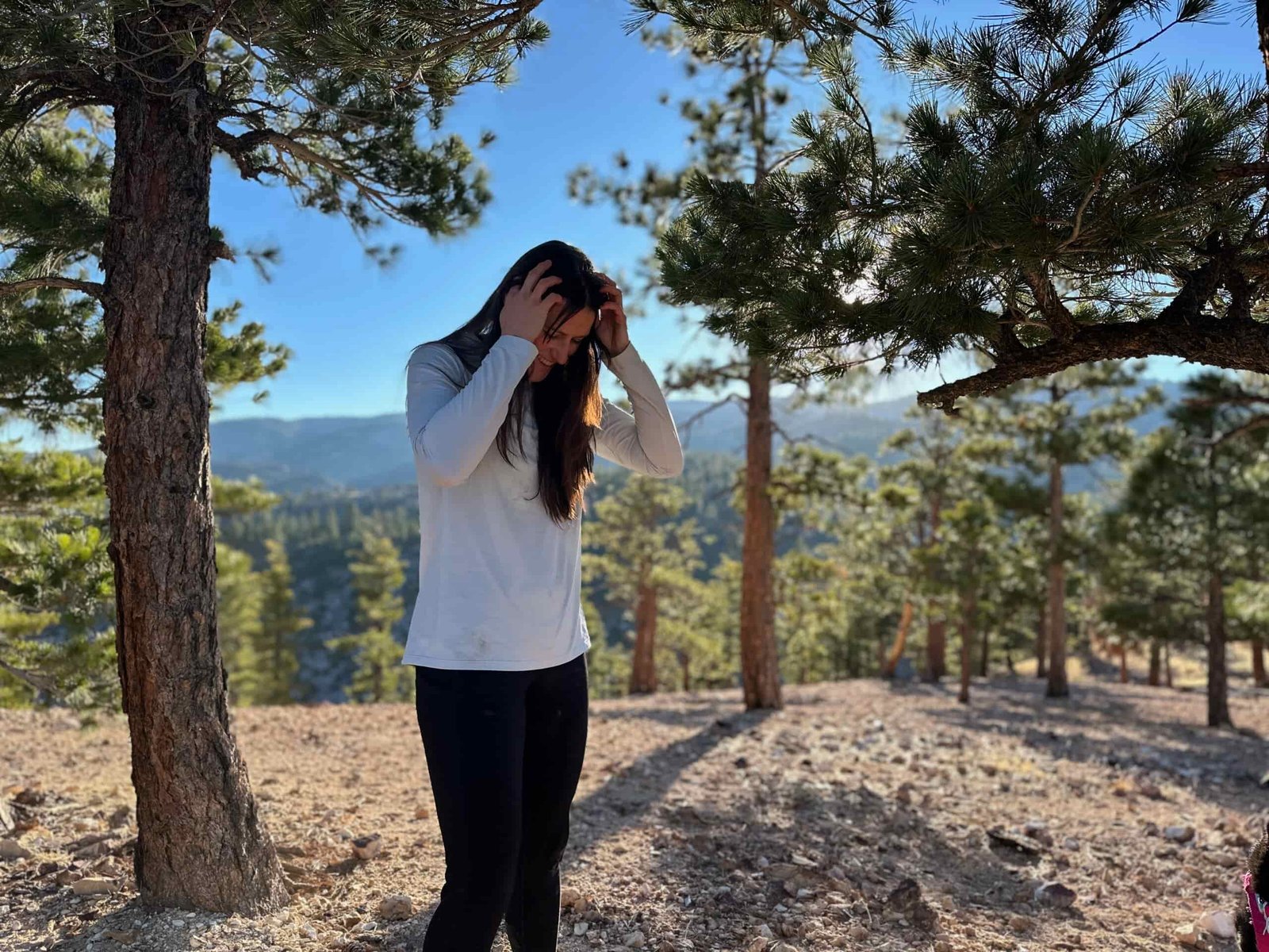 woman hiking and running through high desert