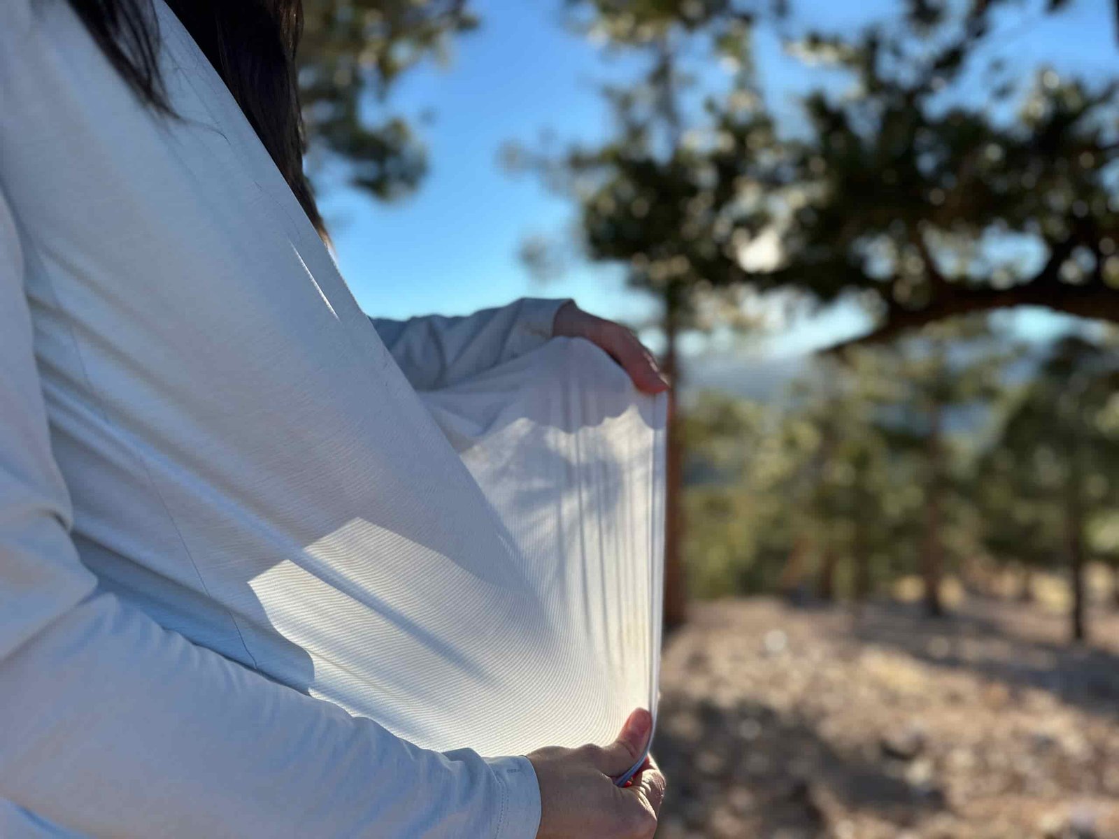 woman hiking and running through high desert