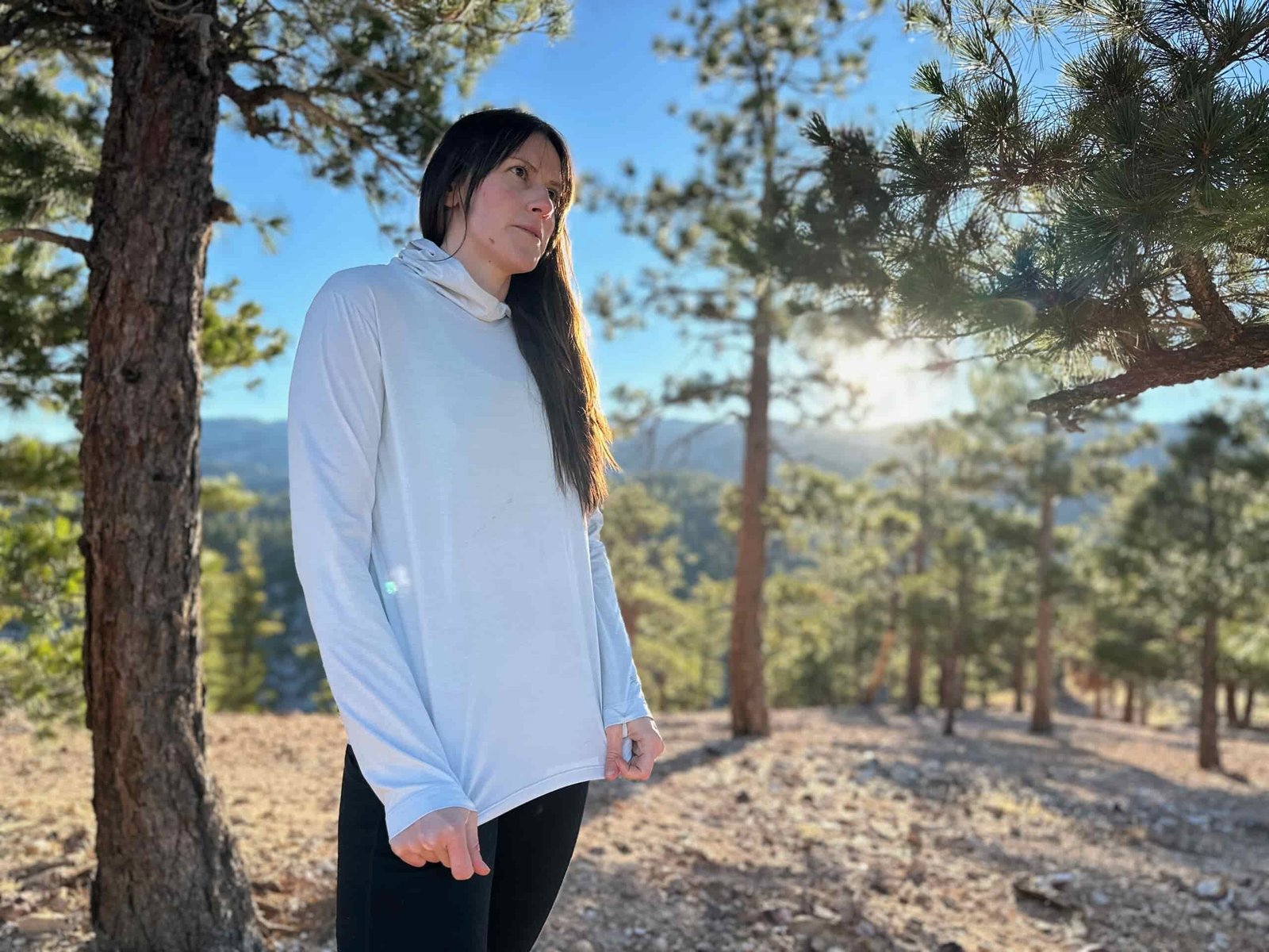 woman hiking and running through high desert
