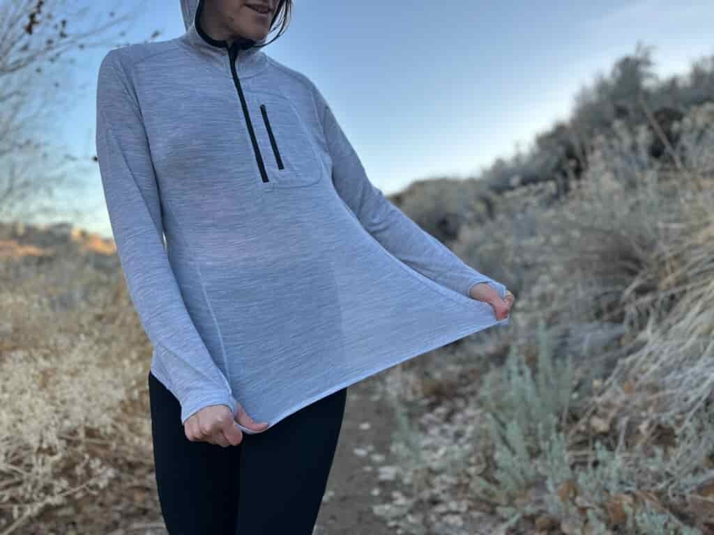 woman hiking around high desert plants 
