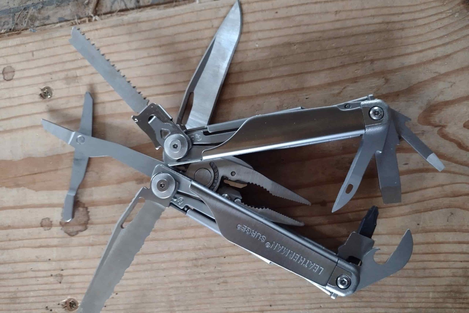 The Leatherman Surge, on a board with its tools deployed.