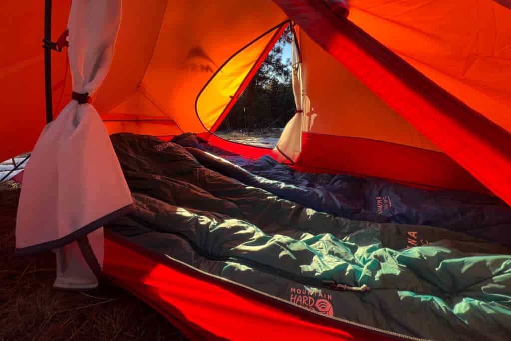 Interior view of the MSR Access 2 tent showing two sleeping bags and ample space.