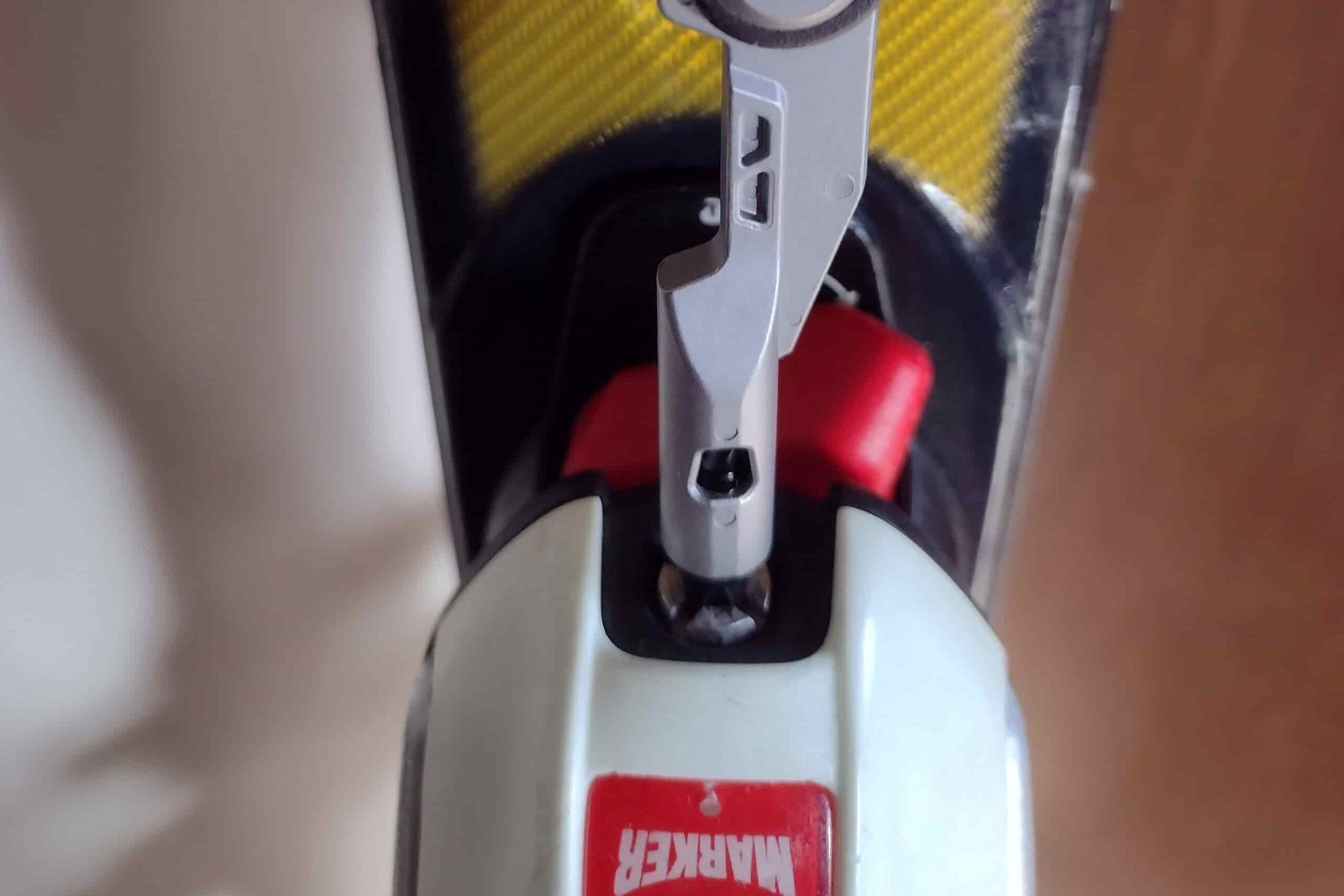 The Gerber Armbar Drive with its bit driver adjusting a ski binding.