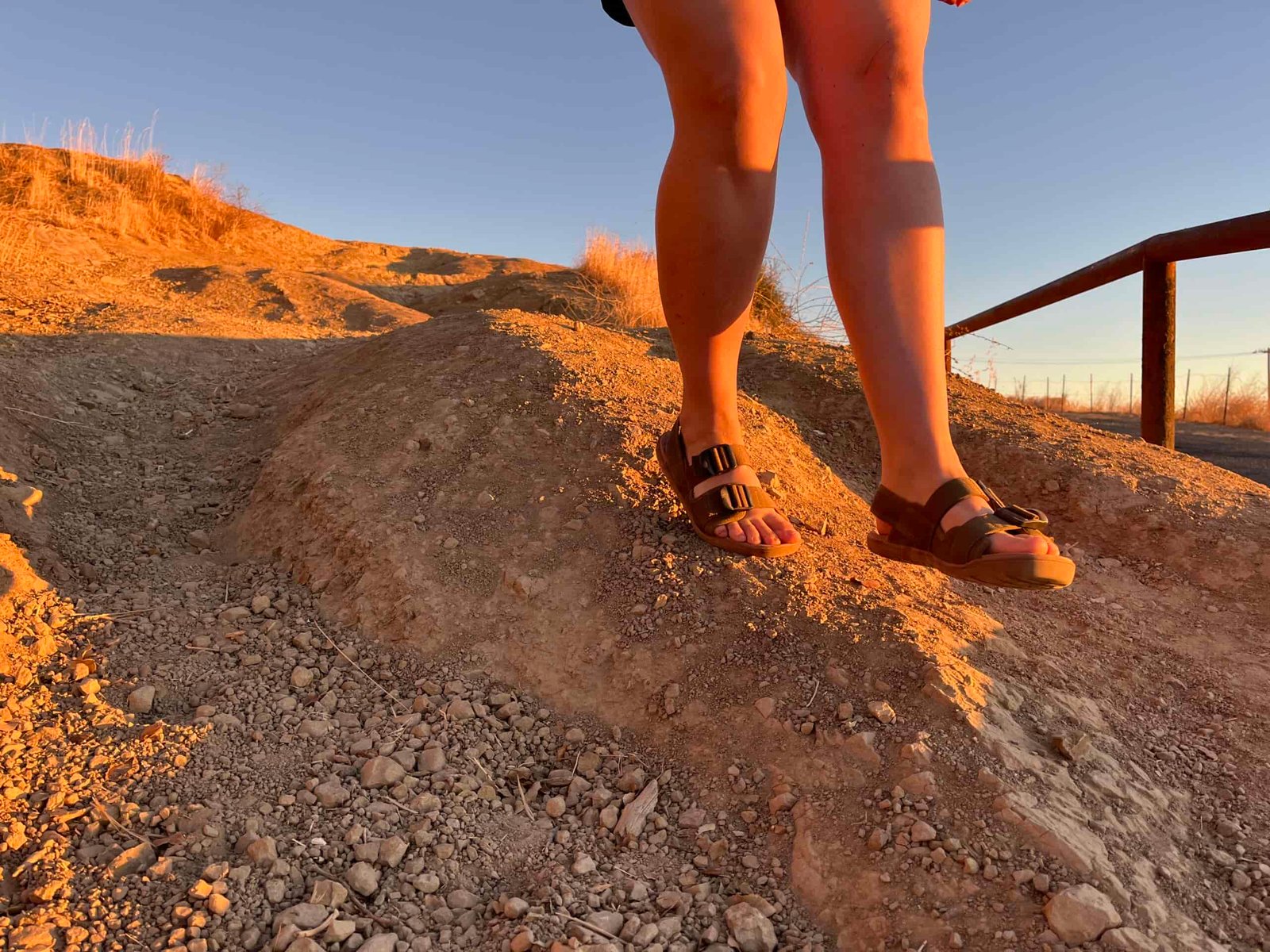 Our tester wearing the Astral Webber sandals on a hike.