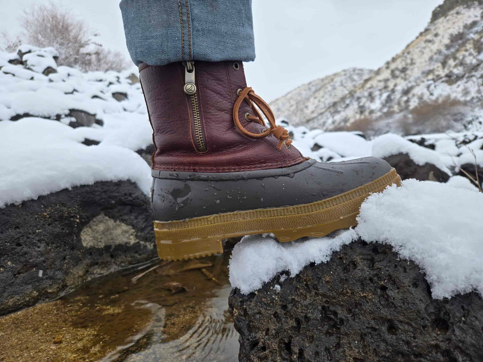 side view of the zipper on the sperry saltwater rain boots
