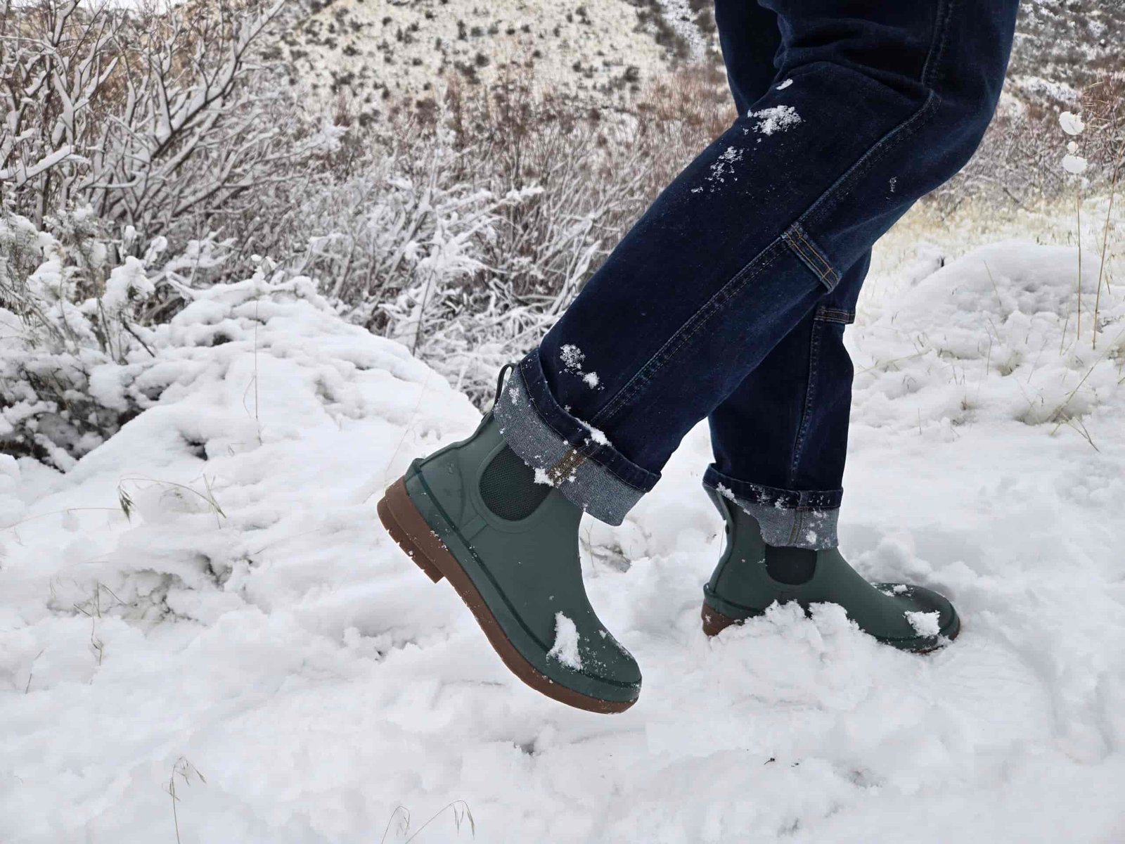 someone in jeans and bogs amanda chelseas walking in the snow