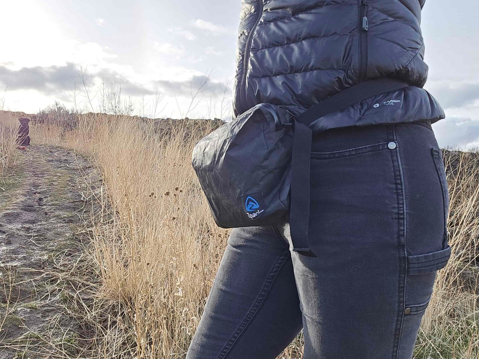 a woman wearing the zpacks fupa on the front of her body
