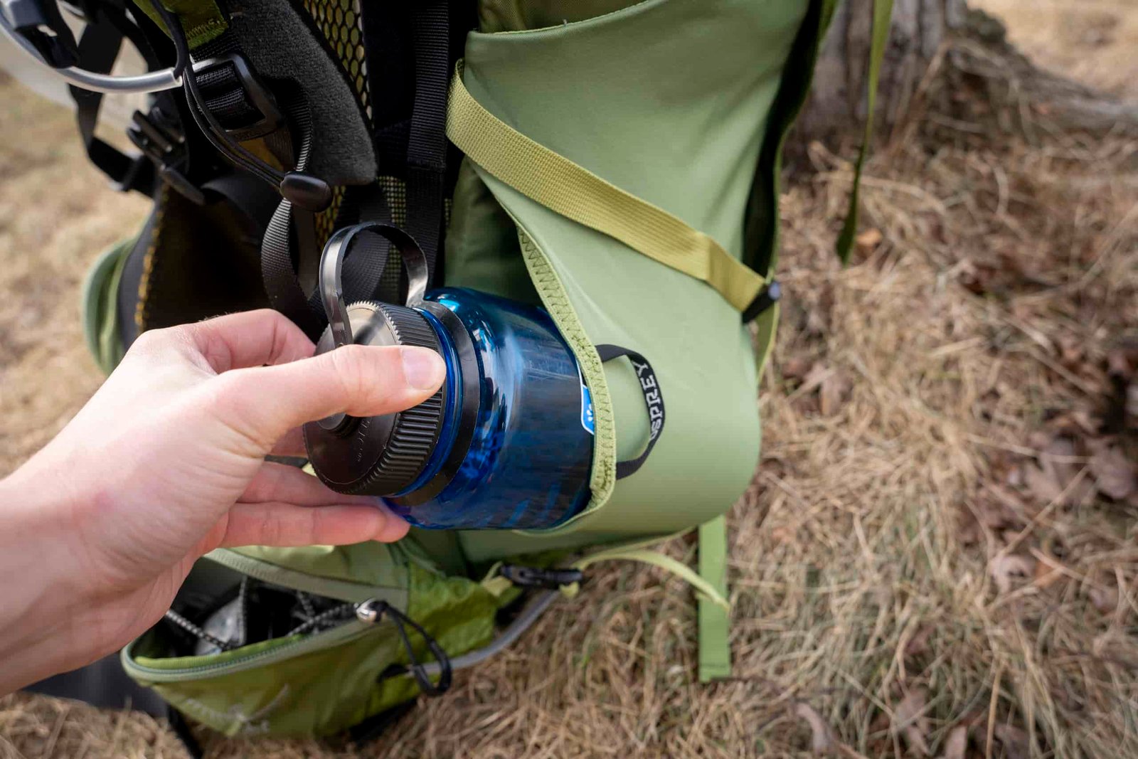 water bottle in side pocket of backpack