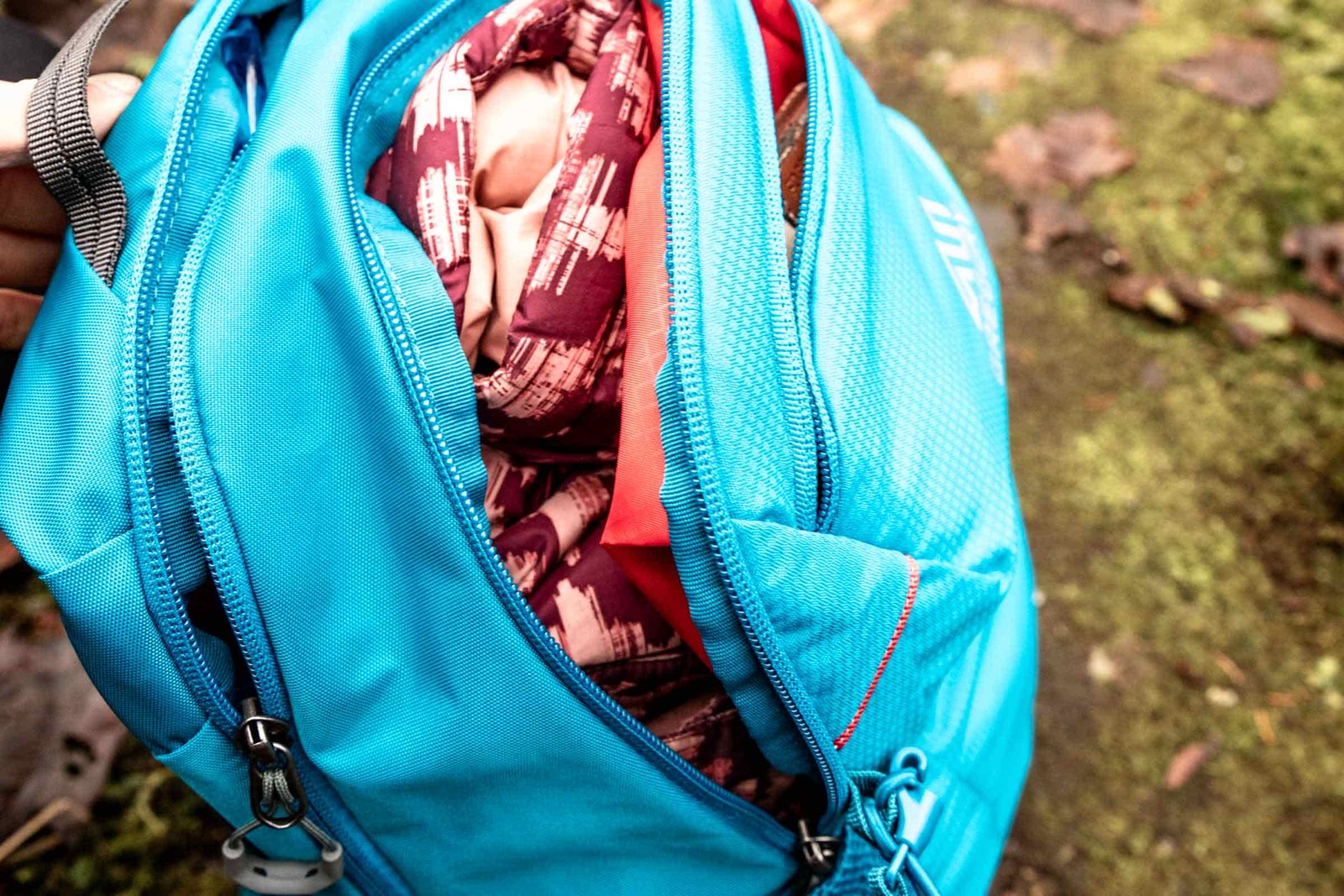 Details of Gregory Swift 16 H2O - a jacket inside an open compartment of the pack