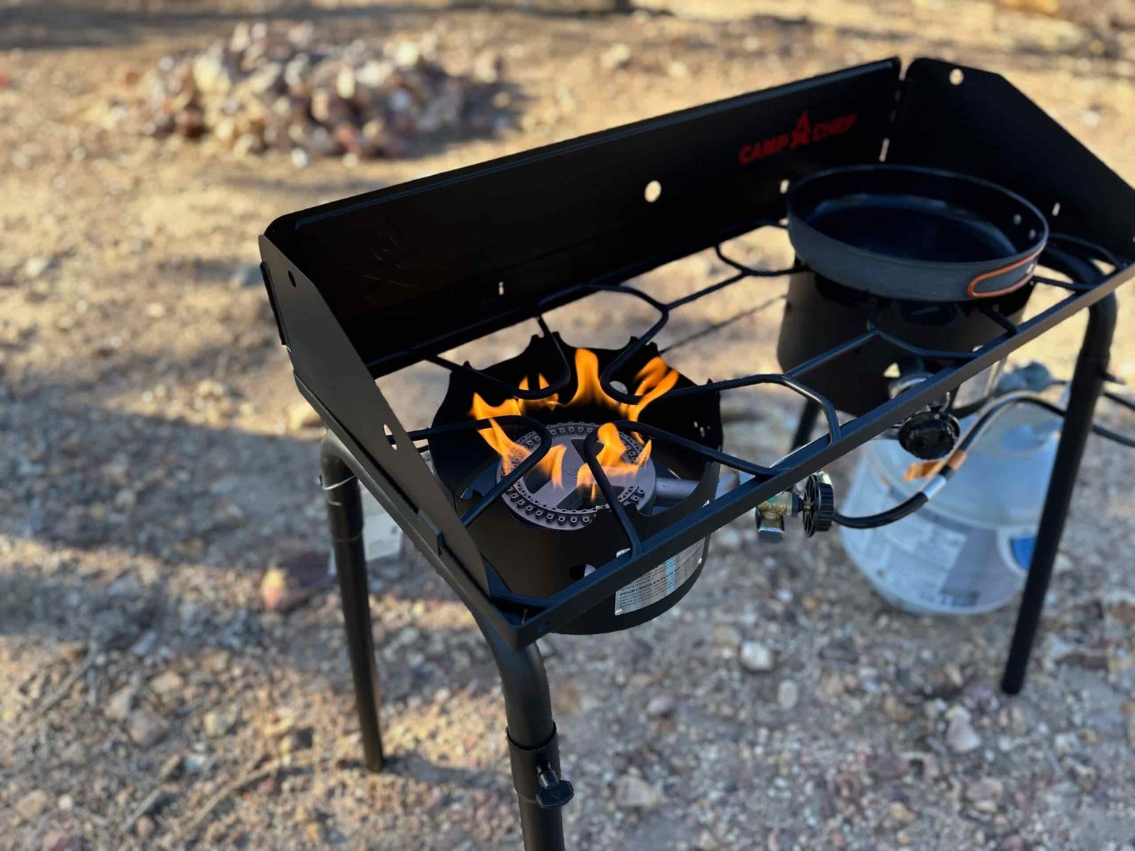 the Camp Chef EX60LW Explorer 2 Burner Outdoor Camping Modular Cooking Stove in a gorgeous, rocky high desert camp ground