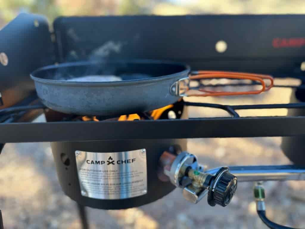 the Camp Chef EX60LW Explorer 2 Burner Outdoor Camping Modular Cooking Stove in a gorgeous, rocky high desert camp ground