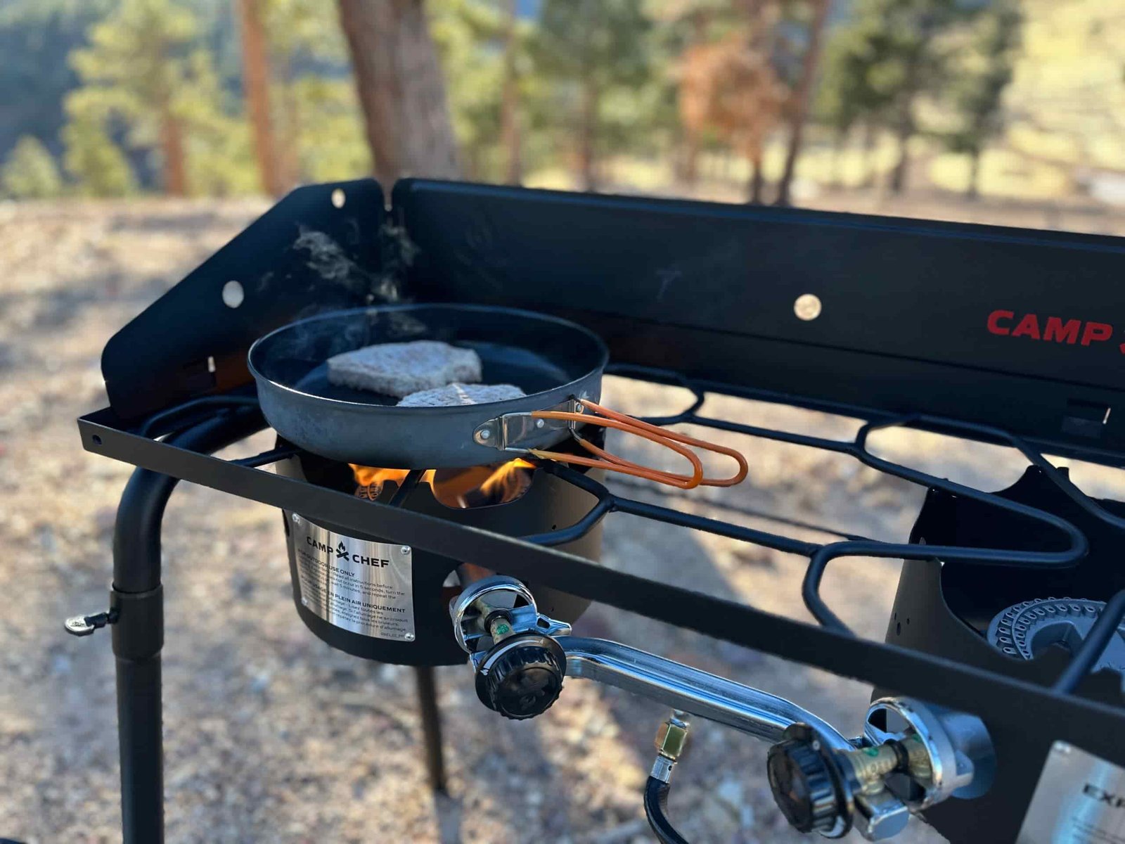 the Camp Chef EX60LW Explorer 2 Burner Outdoor Camping Modular Cooking Stove in a gorgeous, rocky high desert camp ground