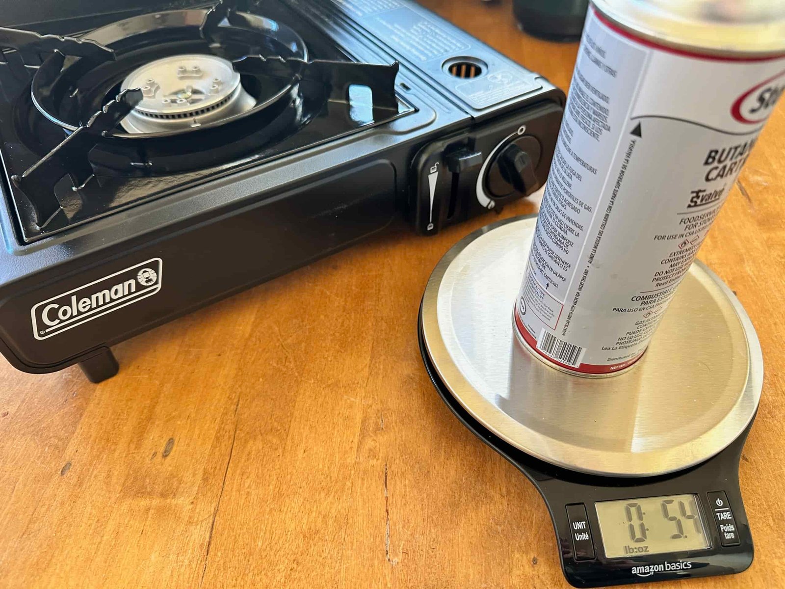 A close up of a scale weighing fuel for a stove to show efficiency