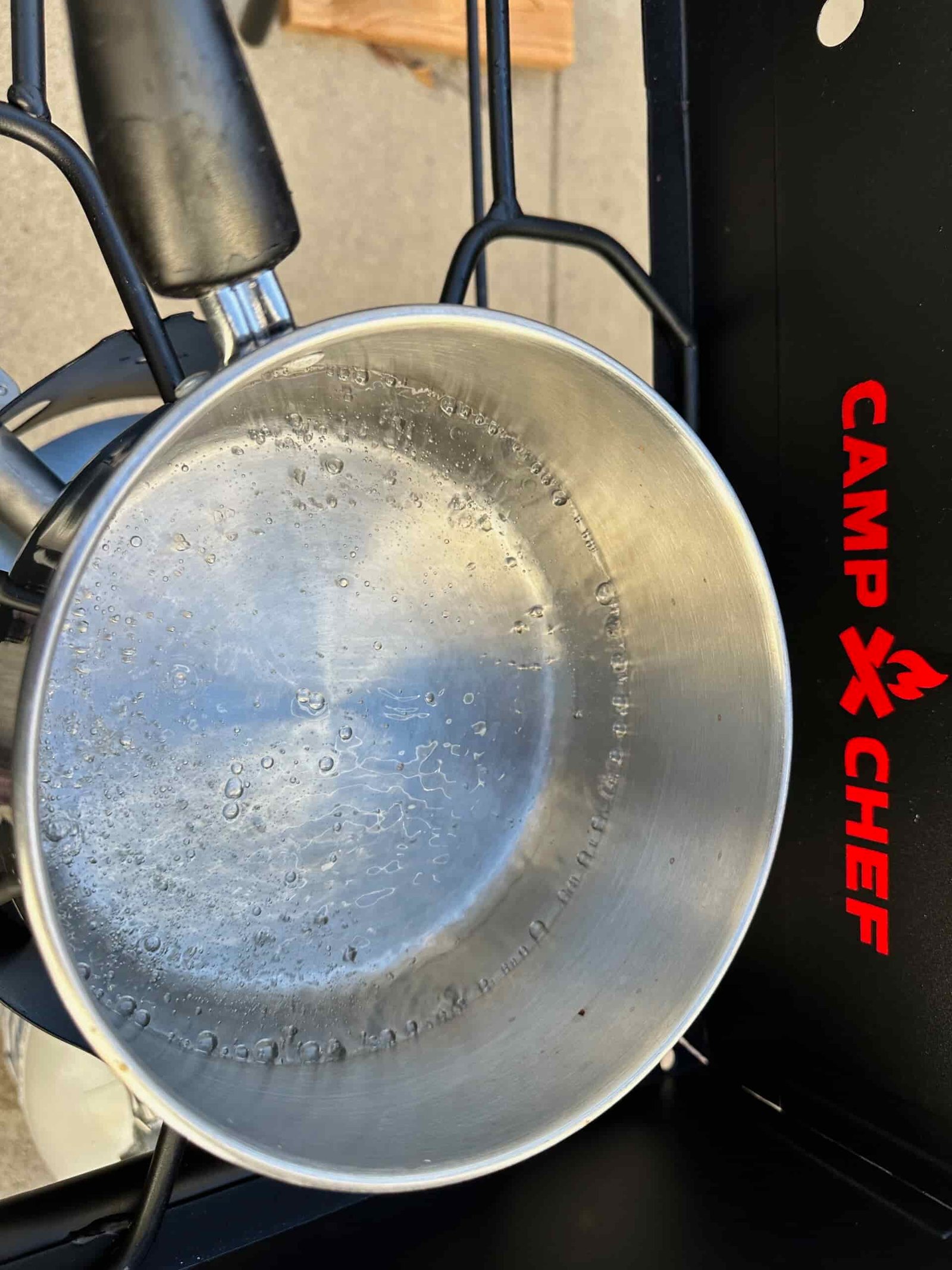close up of a pot of water boiling on the Camp Chef EX60LW Explorer 2 Burner Outdoor Camping Modular Cooking Stove