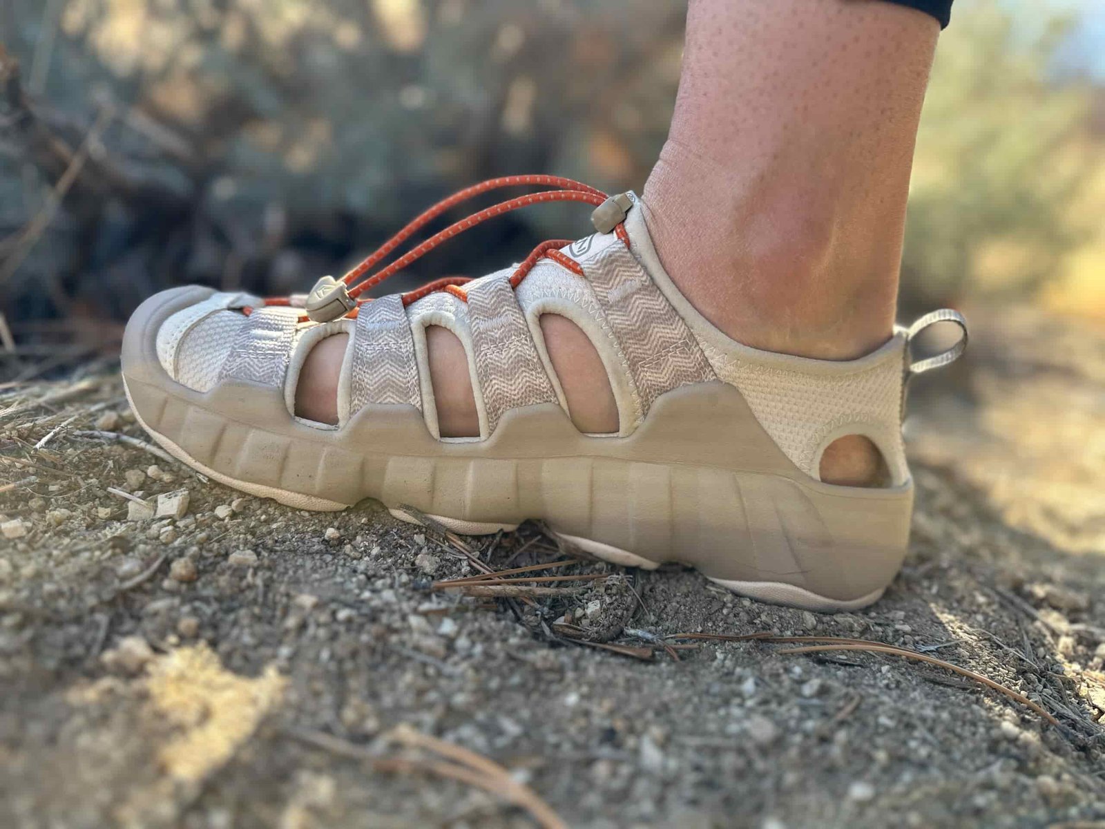 A woman showing how the Keen Hyperport H2 Sandal fits