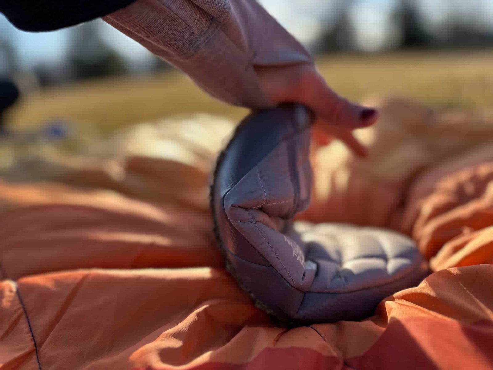 The bend squeeze twist tests The North Face ThermoBall Traction Mules V