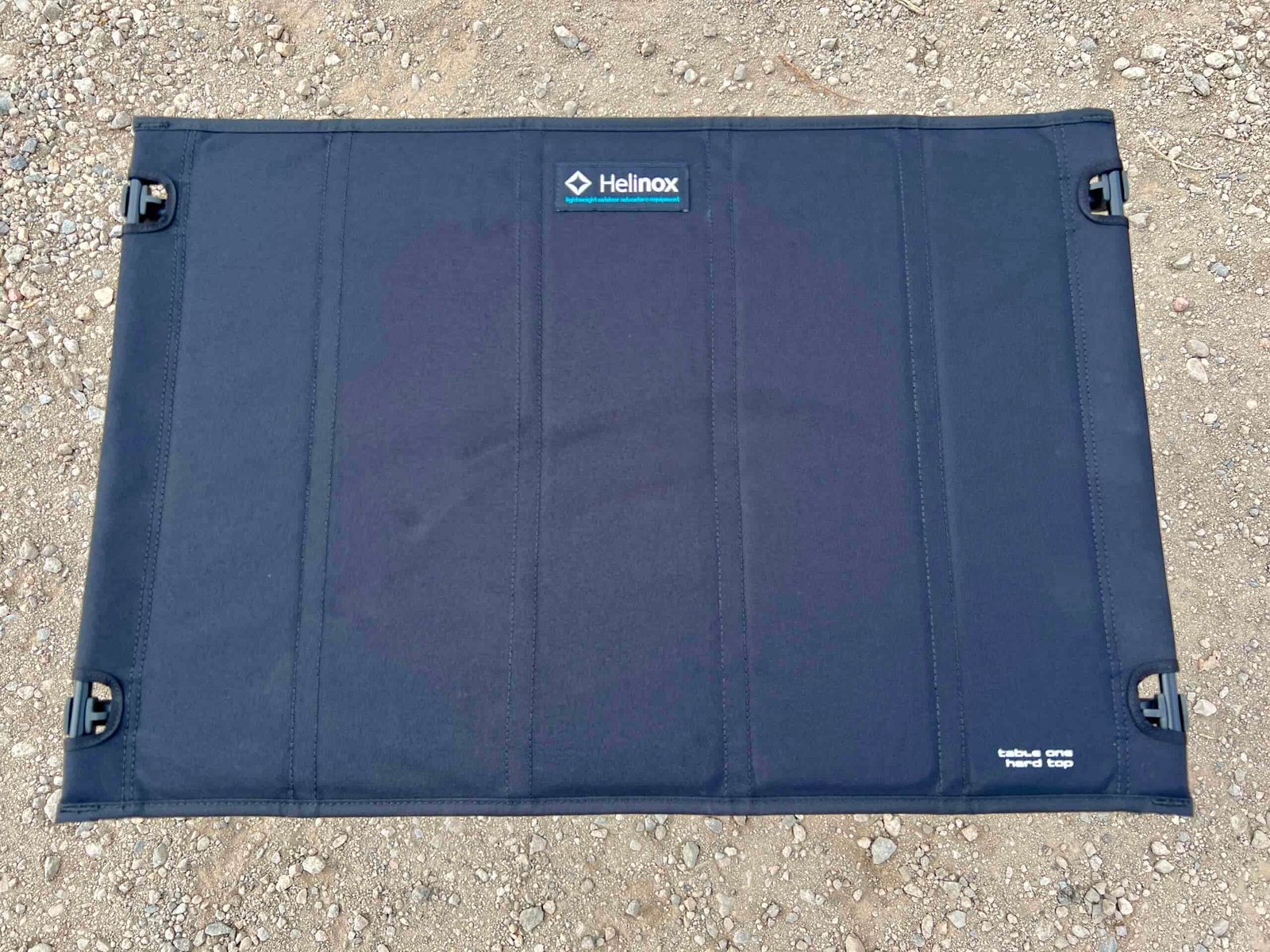 The Helinox One Hard Top stands on dirt.