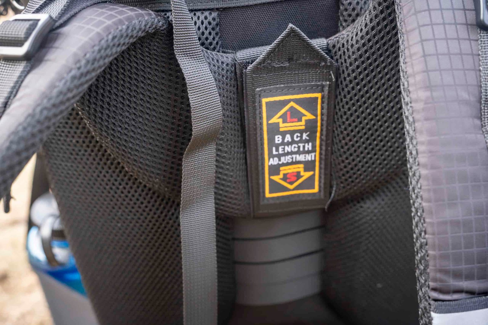 a torso adjustment on a backpack