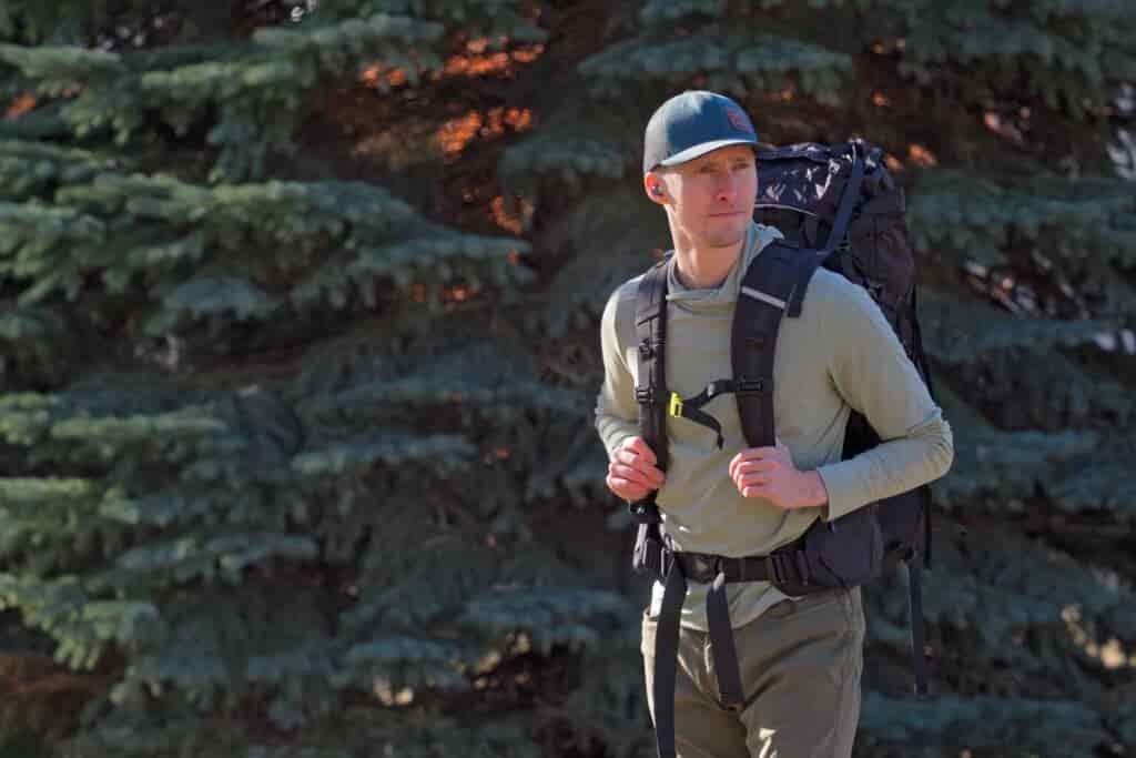 a man wearing a black backpack