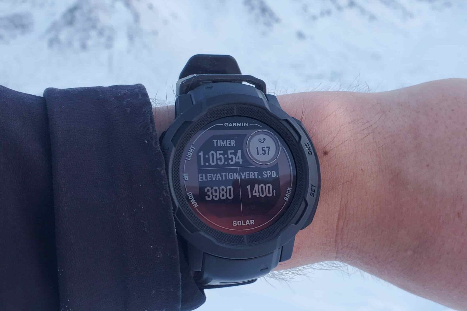A closeup of a watch face showing stats and metrics from an activity.