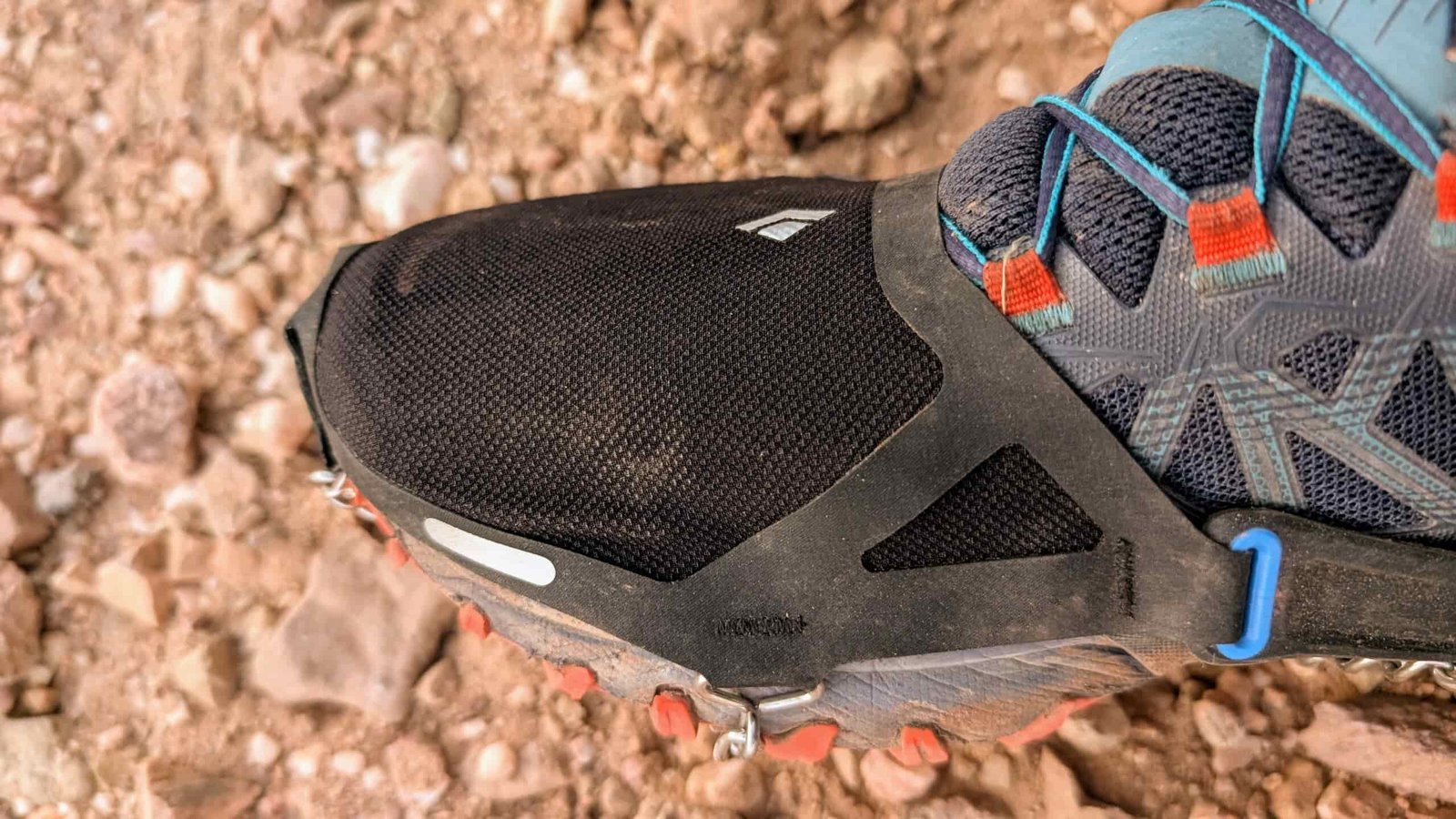 a close up of the toe cap of a pair of ice cleats