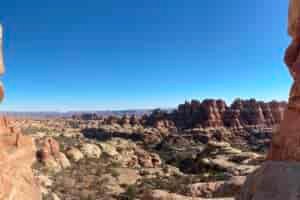 Cloudless blue sky with deep red rock canyons in Canyonlands National Park
