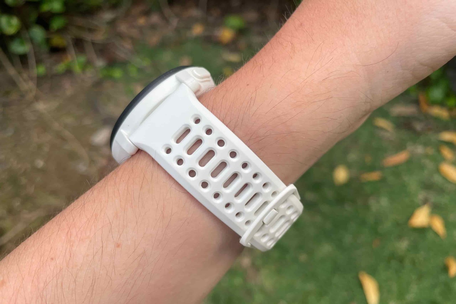 A closeup of a watch being worn on the wrist.