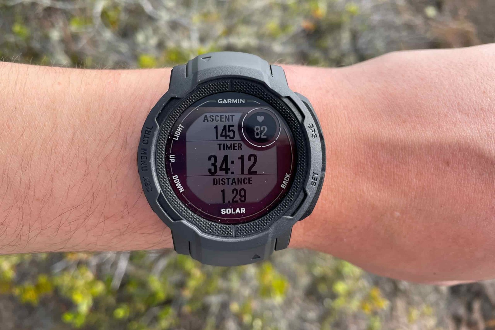 A closeup of a watch face showing it's dual screen.