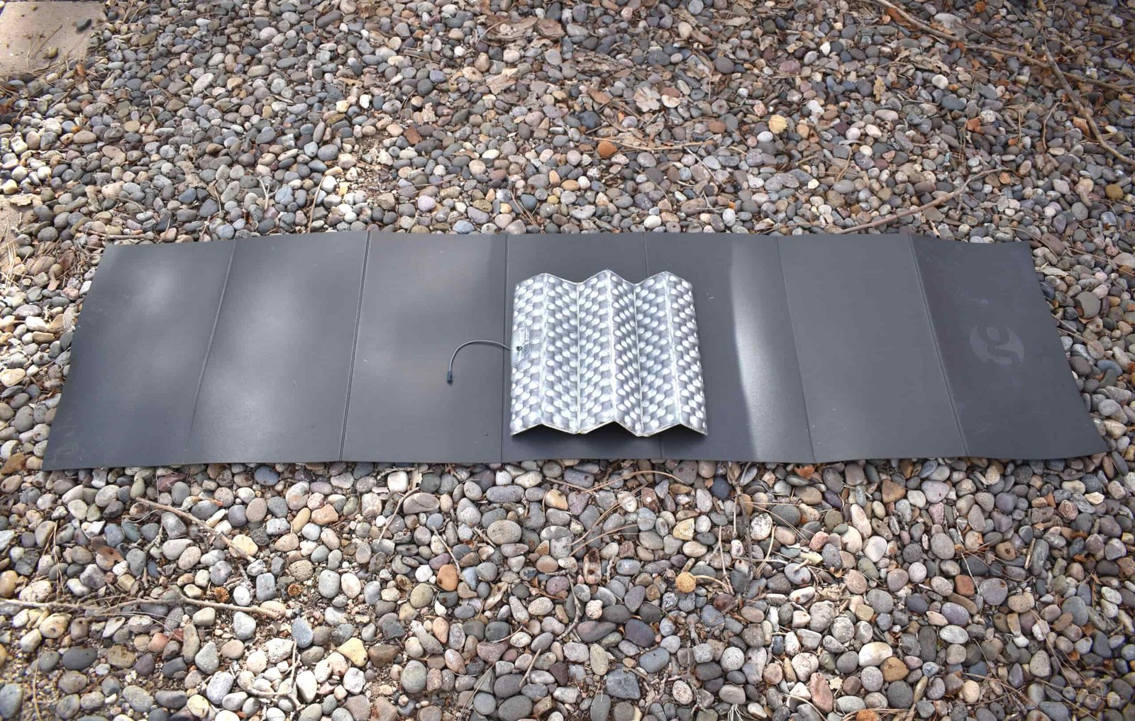Z-seat sit pad on top of the Gossamer Gear Thinlight Foam Pad to compare their surface areas
