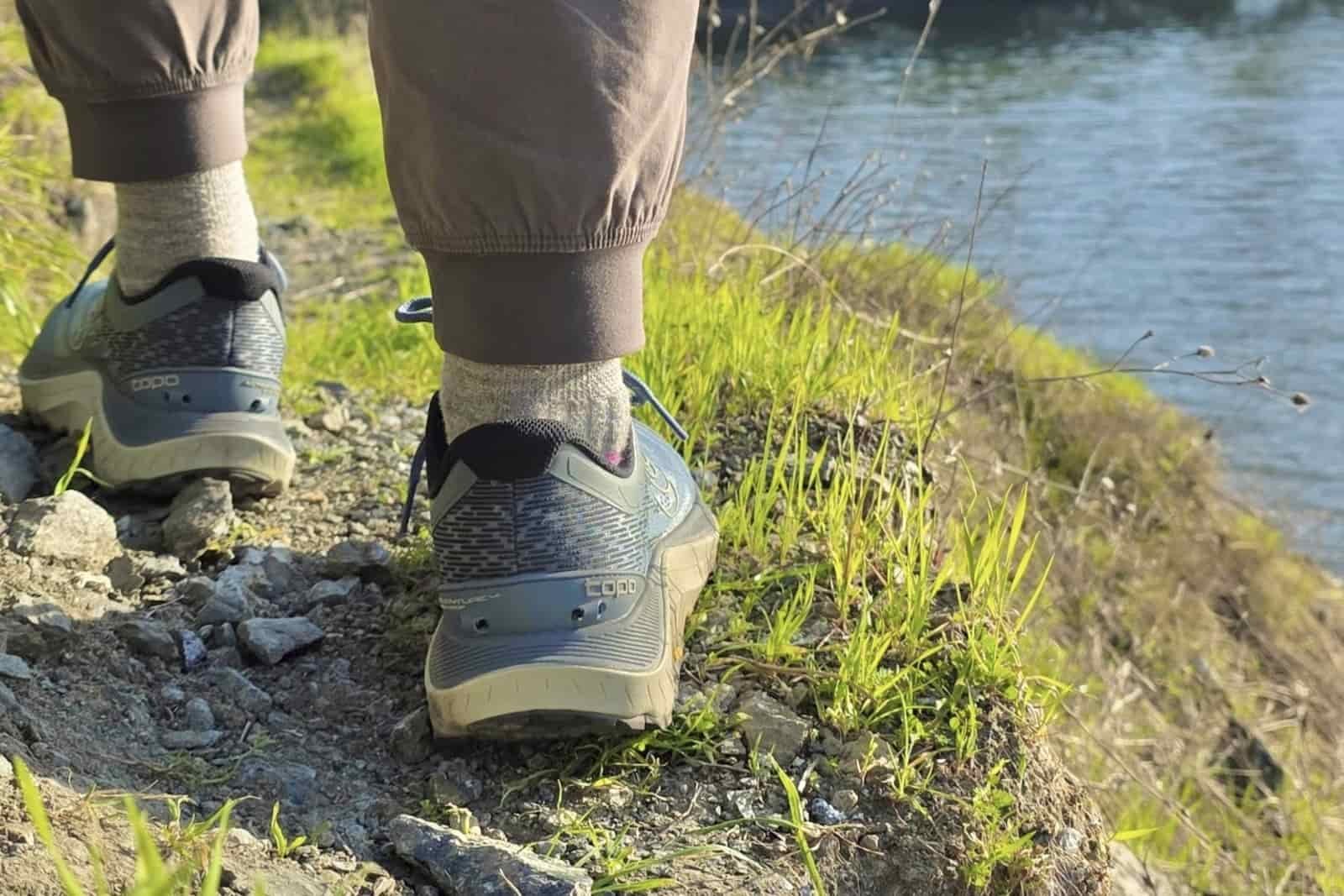 Close up of the heel of the Topo Ultraventure 4 hiking shoes while out on a trail.
