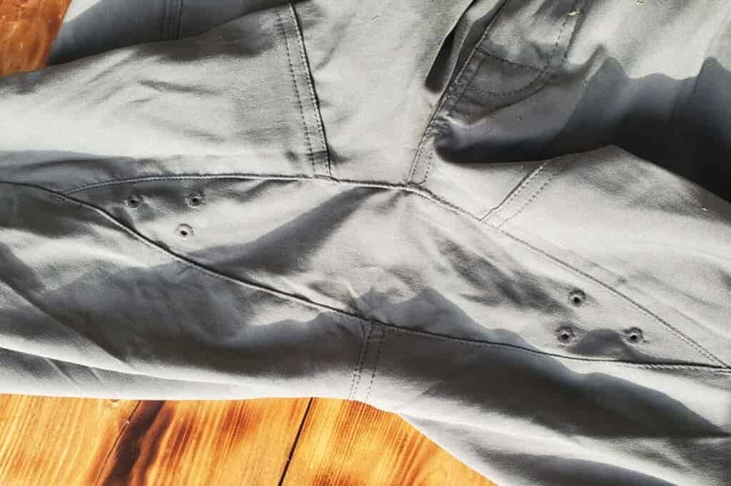 A closeup of the crotch on a pair of hiking pants.