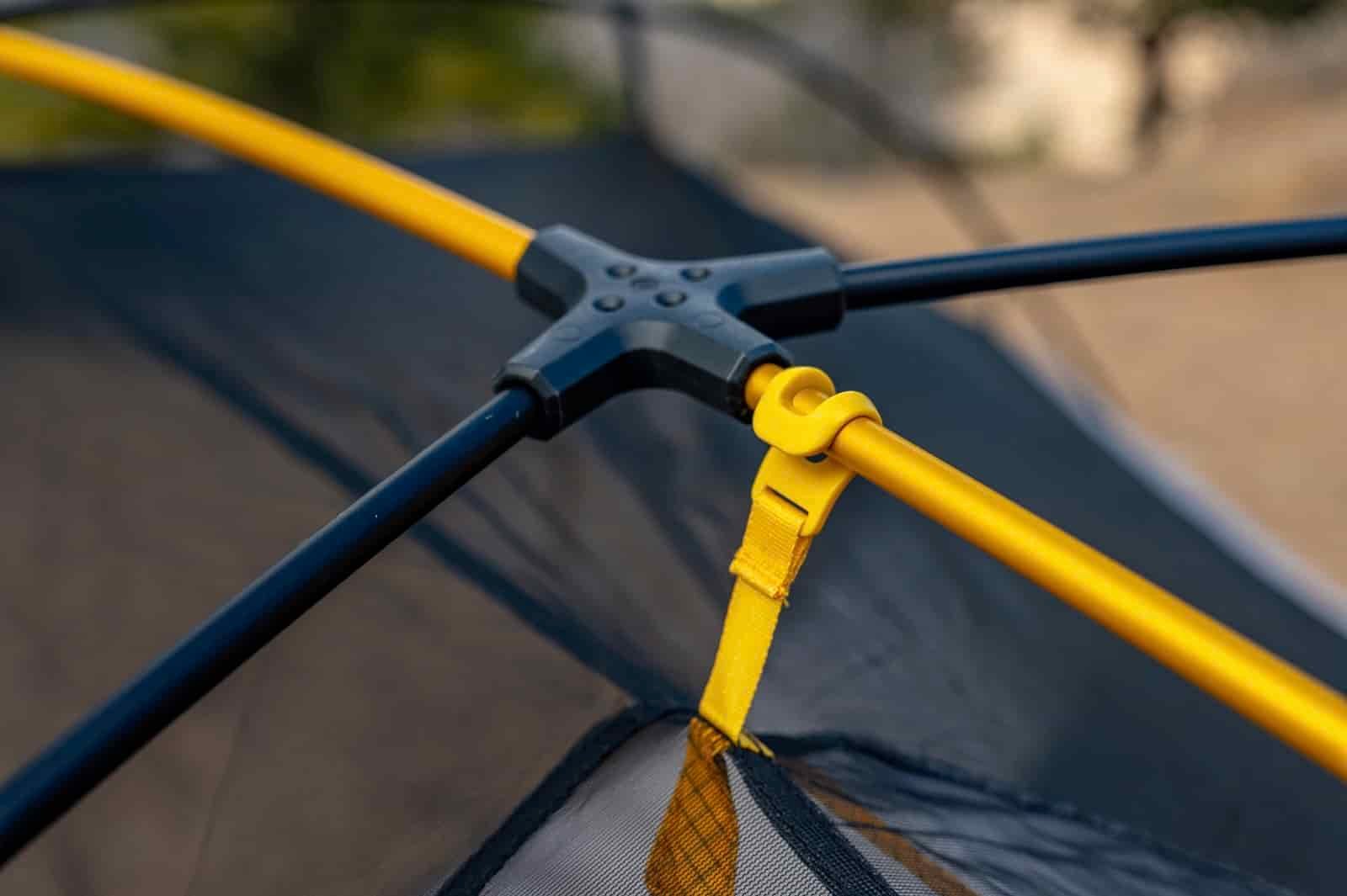 a close up of a tent pole hub section