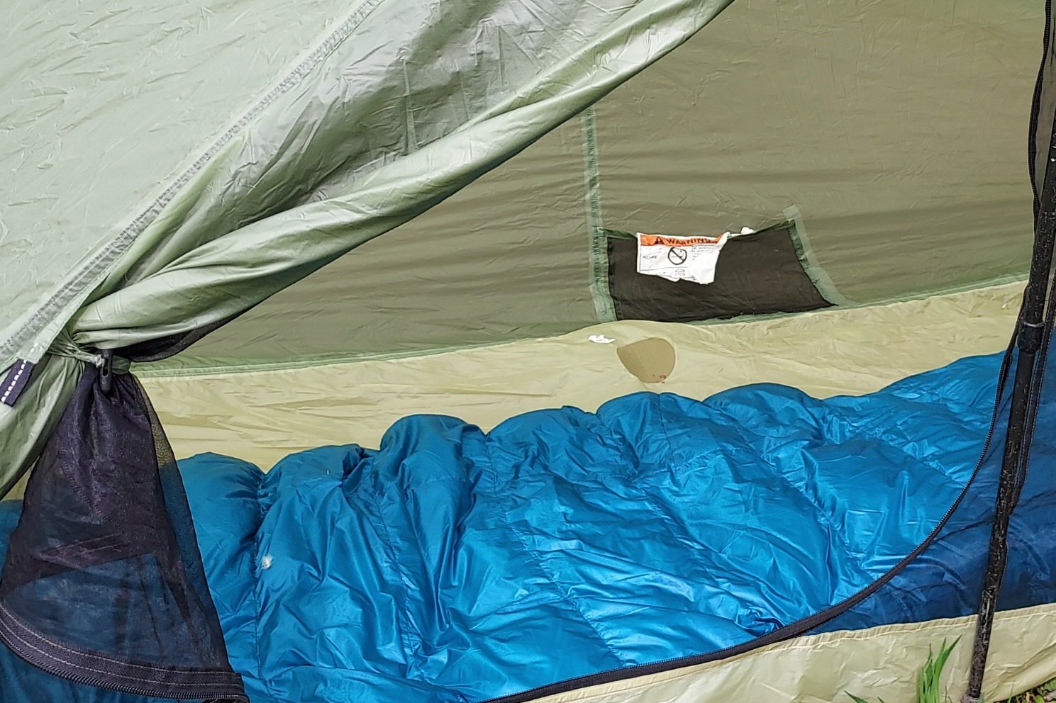 The Katabatic Flex 22 Quilt inside a tent