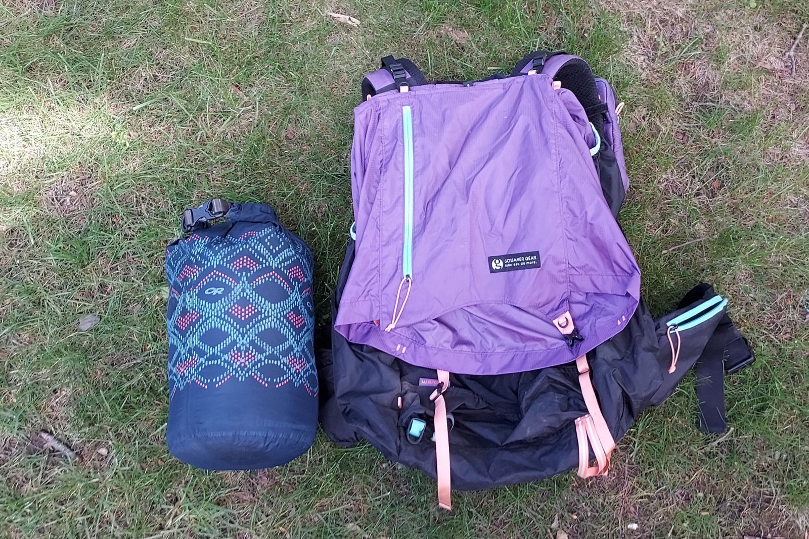 Hyperlite Mountain Gear 20-Degree Quilt packed with a standard 60L ultralight backpack for scale